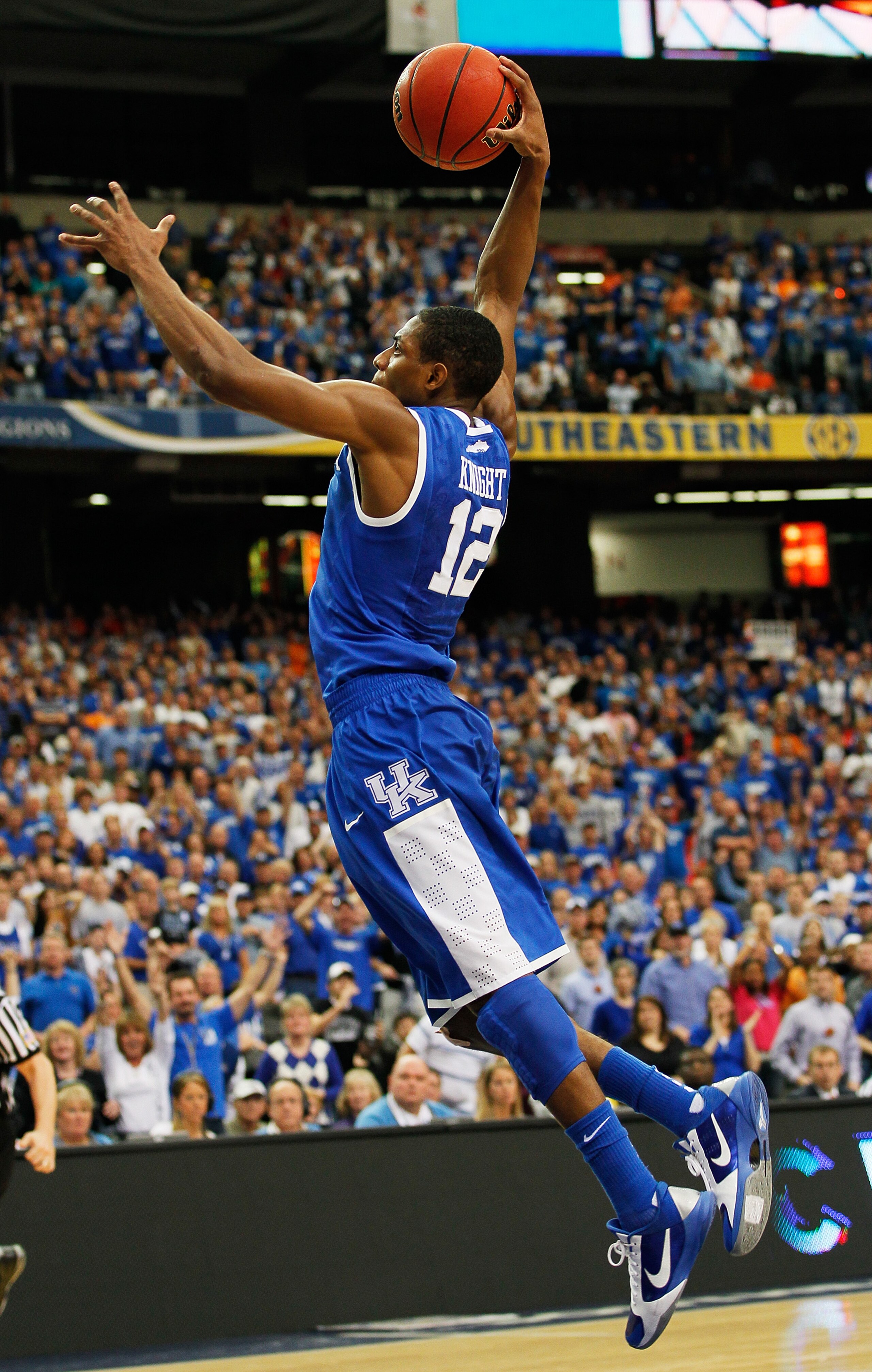 ATLANTA, GA - MARCH 13:  Brandon Knight #12 of the Kentucky Wildcats dunks on the Florida Gators during the championship game of the SEC Men's Basketball Tournament at Georgia Dome on March 13, 2011 in Atlanta, Georgia.  (Photo by Kevin C. Cox/Getty Image