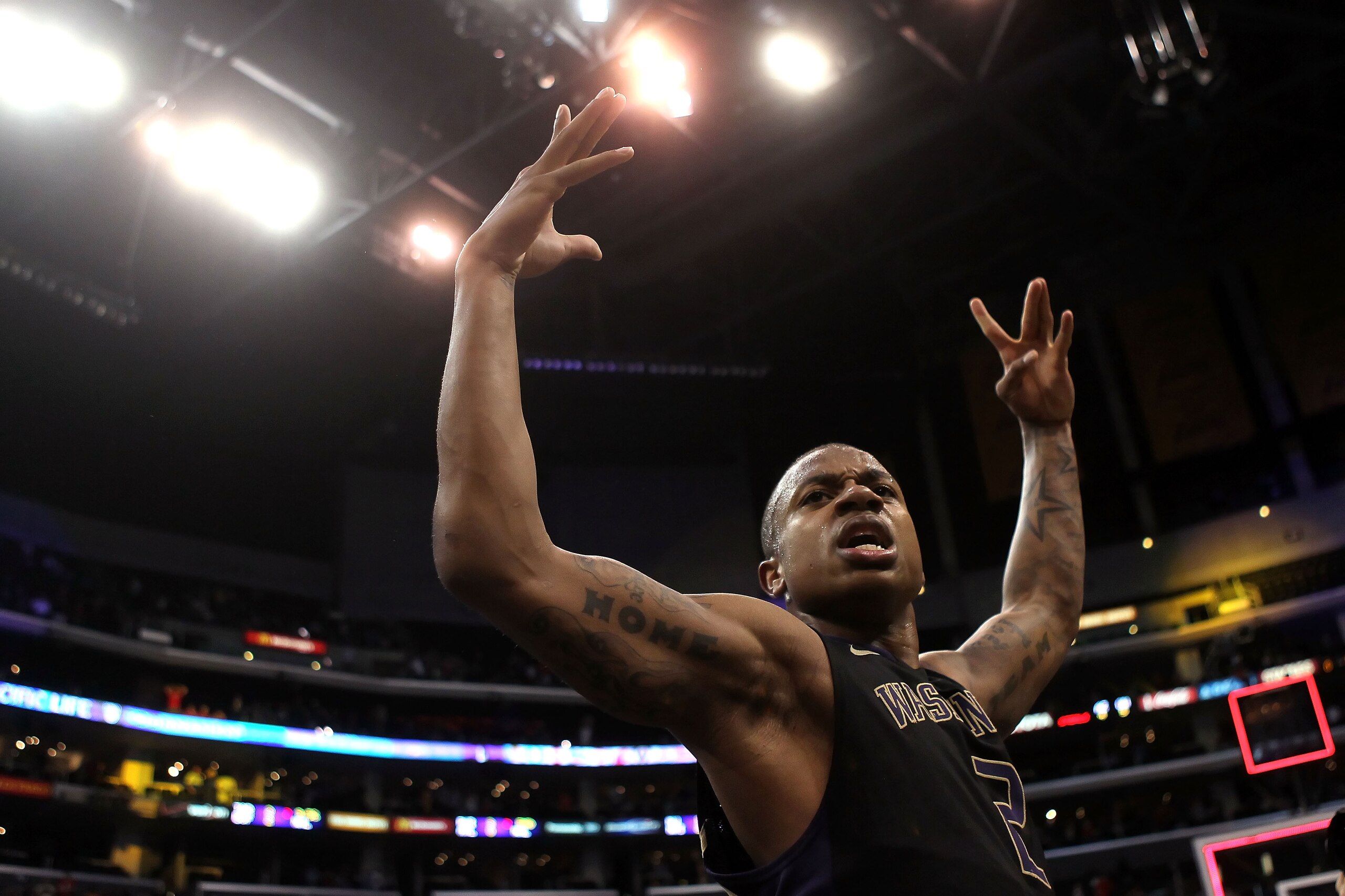 LOS ANGELES, CA - MARCH 12:  Isaiah Thomas #2 of the Washington Huskies reacts after making a last-second shot in overtime to defeat the Arizona Wildcats 77-75 in the championship game of the 2011 Pacific Life Pac-10 Men's Basketball Tournament at Staples