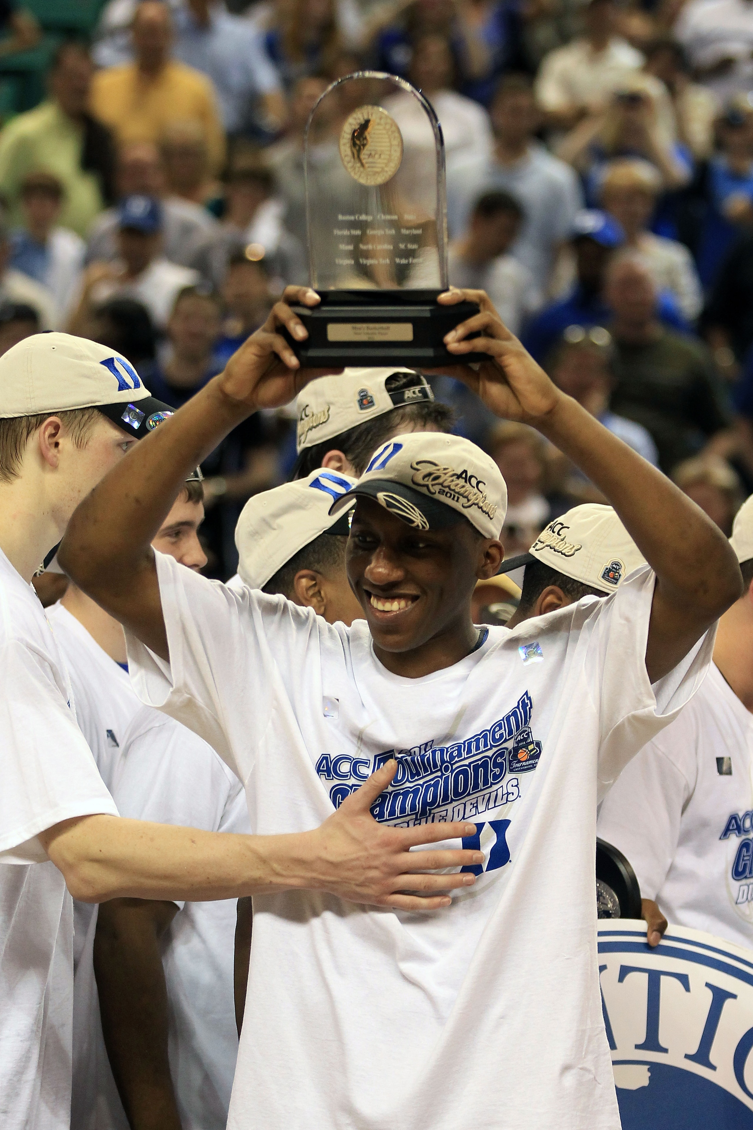 GREENSBORO, NC - MARCH 13:  Nolan Smith #2 of the Duke Blue Devils celebrates after being named MVP and defeating the North Carolina Tar Heels 75-58 in the championship game of the 2011 ACC men's basketball tournament at the Greensboro Coliseum on March 1