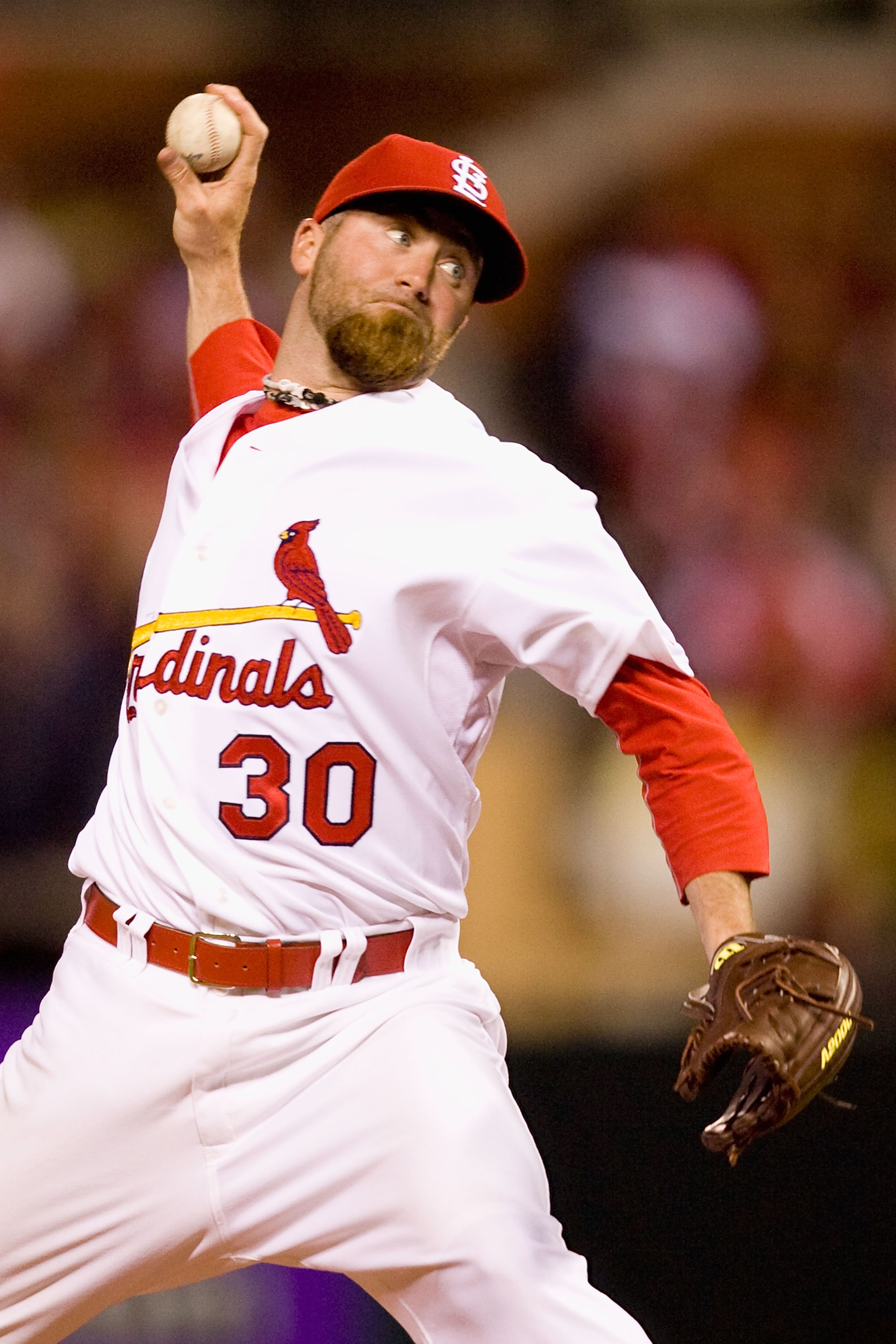 ST. LOUIS - APRIL 27: Relief pitcher Jason Motte #30 of the St. Louis Cardinals throws against the Atlanta Braves at Busch Stadium on April 27, 2010 in St. Louis, Missouri.  The Cardinals beat the Braves 5-4.  (Photo by Dilip Vishwanat/Getty Images)