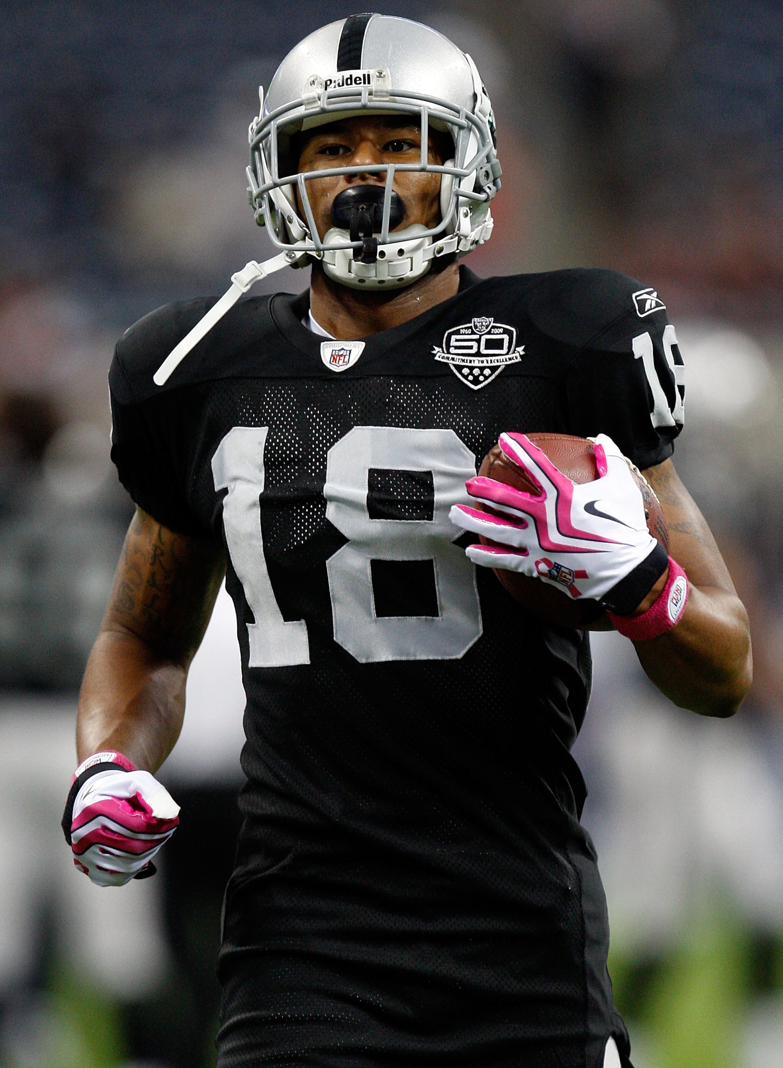 HOUSTON - OCTOBER 04:  Wide receiver Louis Murphy #18 of the Oakland Raiders at Reliant Stadium on October 4, 2009 in Houston, Texas.  (Photo by Ronald Martinez/Getty Images)