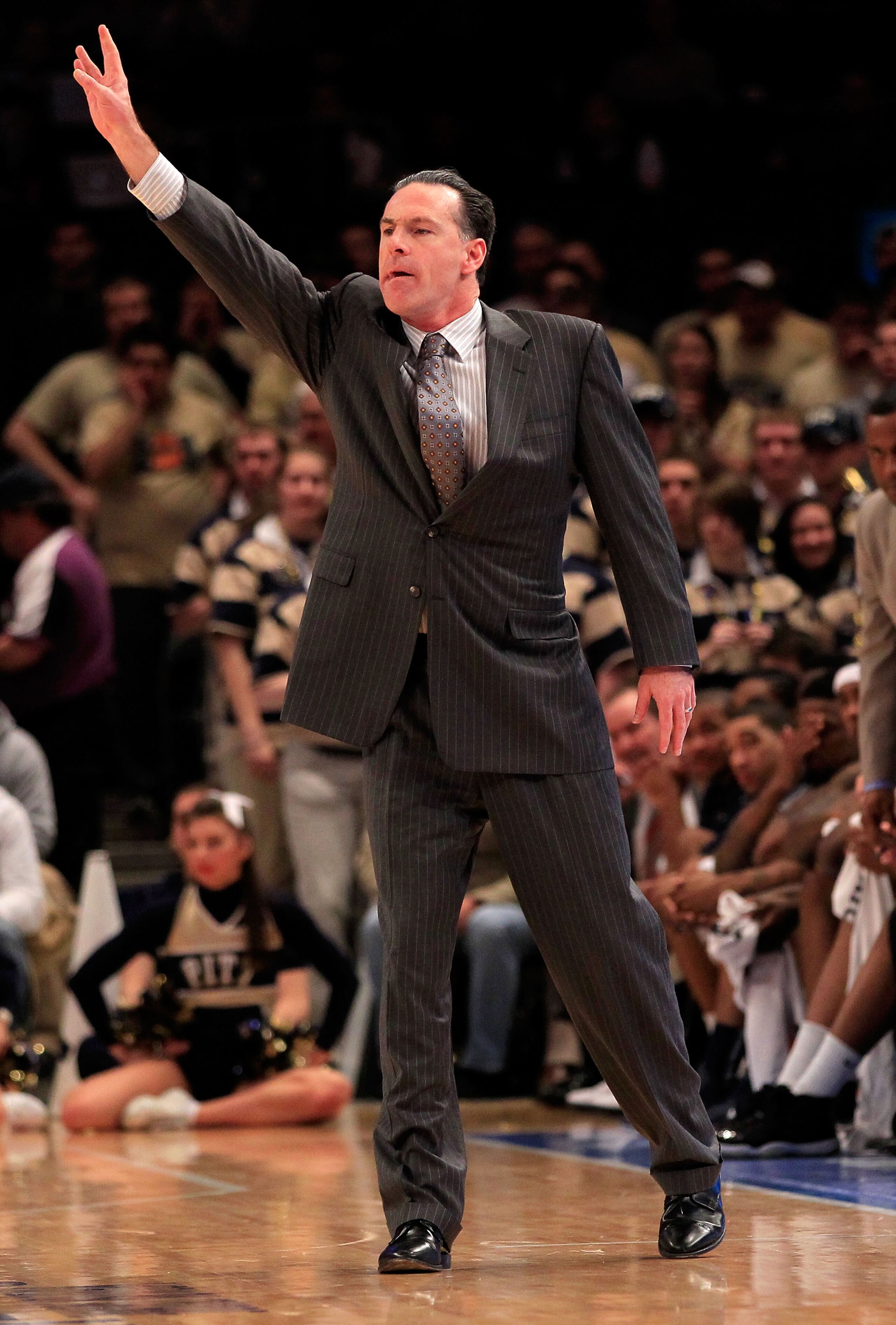 NEW YORK, NY - MARCH 10: head coach Jamie Dixon of the Pittsburgh Panthers gestures from the bench against the Connecticut Huskies during the quarterfinals of the 2011 Big East Men's Basketball Tournament presented by American Eagle Outfitters at Madiso NEW YORK, NY - MARCH 10: head coach Jamie Dixon of the Pittsburgh Panthers gestures from the bench against the Connecticut Huskies during the quarterfinals of the 2011 Big East Men's Basketball Tournament presented by American Eagle Outfitters at Madiso