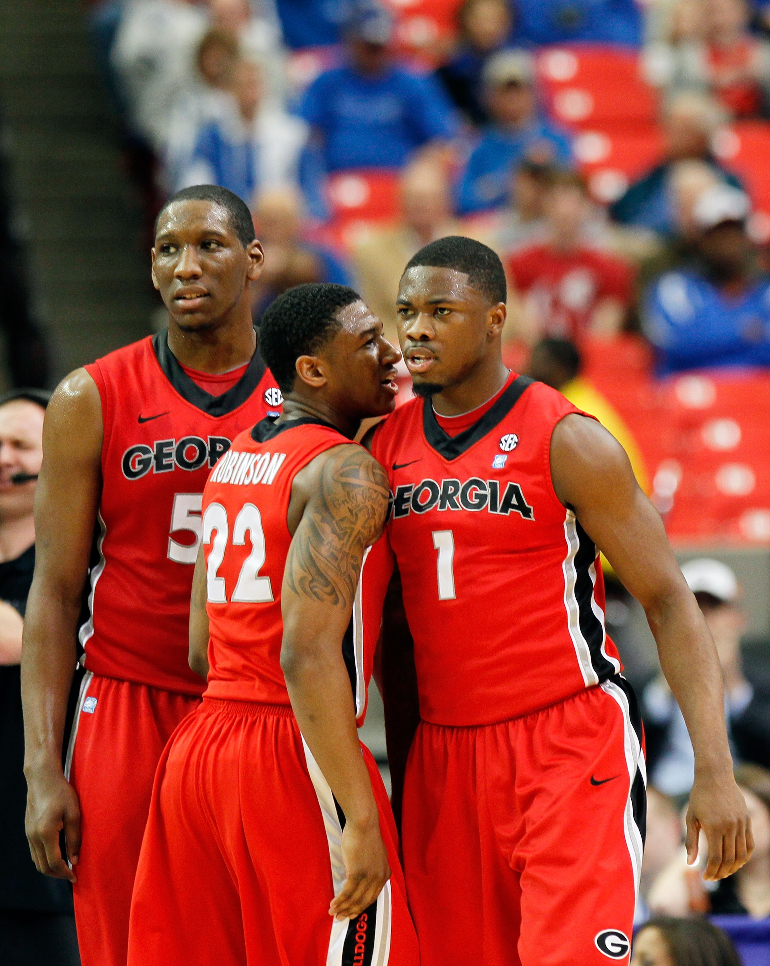 ATLANTA, GA - MARCH 11:  Travis Leslie #1, Gerald Robinson #22 and Jeremy Price #50 of the Georgia Bulldogs react during their game against the Alabama Crimson Tide in the quarterfinals of the SEC Men's Basketball Tournament at Georgia Dome on March 11, 2