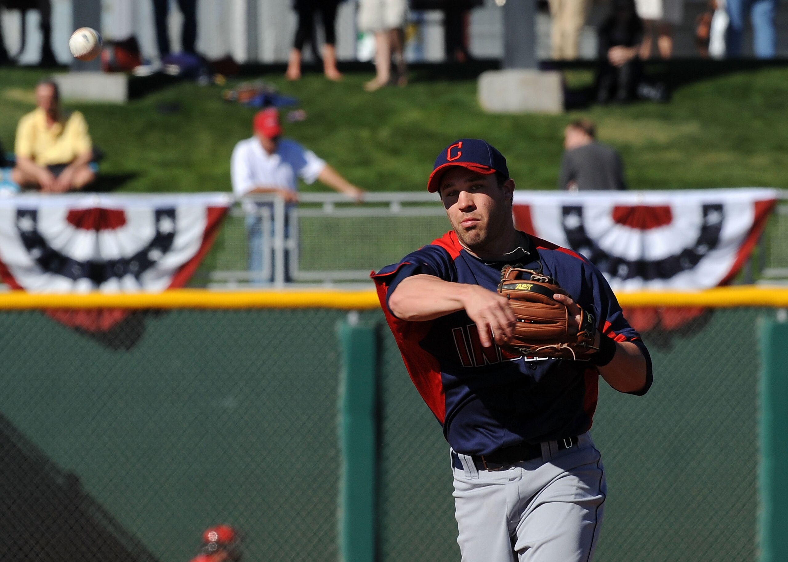 GOODYEAR, AZ - FEBRUARY 28:  Jason Kipnis #72 of the Cleveland Indians throws the ball to first base against the Cincinnati Reds at Goodyear Ballpark on February 28, 2011 in Goodyear, Arizona.  (Photo by Norm Hall/Getty Images)
