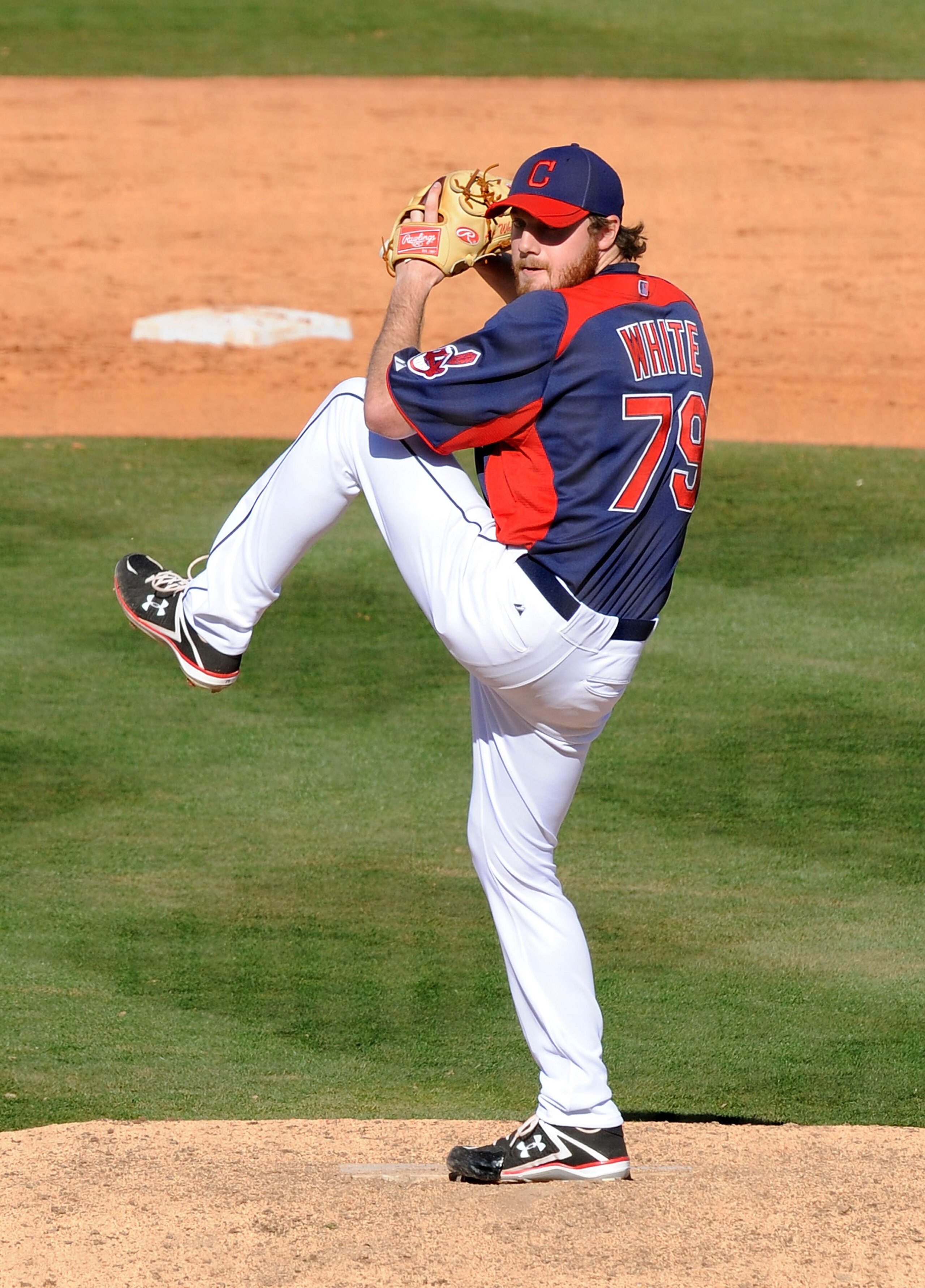 GOODYEAR, AZ - FEBRUARY 27:  Alex White #79 of the Cleveland Indians gets ready to deliver a pitch against the Cincinnati Reds at Goodyear Ballpark on February 27, 2011 in Goodyear, Arizona.  (Photo by Norm Hall/Getty Images)
