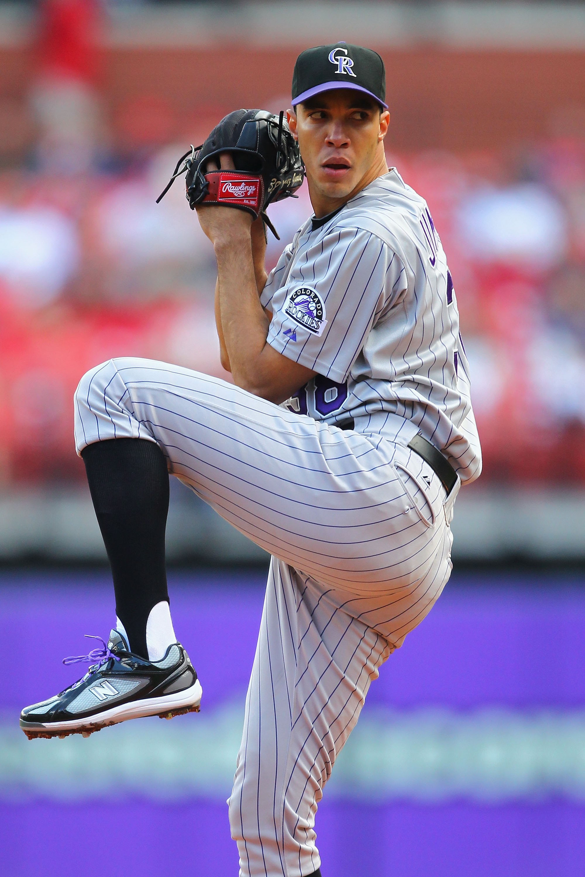 Chicago Cubs pitcher Greg Maddux assists with a play against the St. Louis  Cardinals in the seventh inning at Busch Stadium in St. Louis on April 23,  2006. Maddux won his 4th