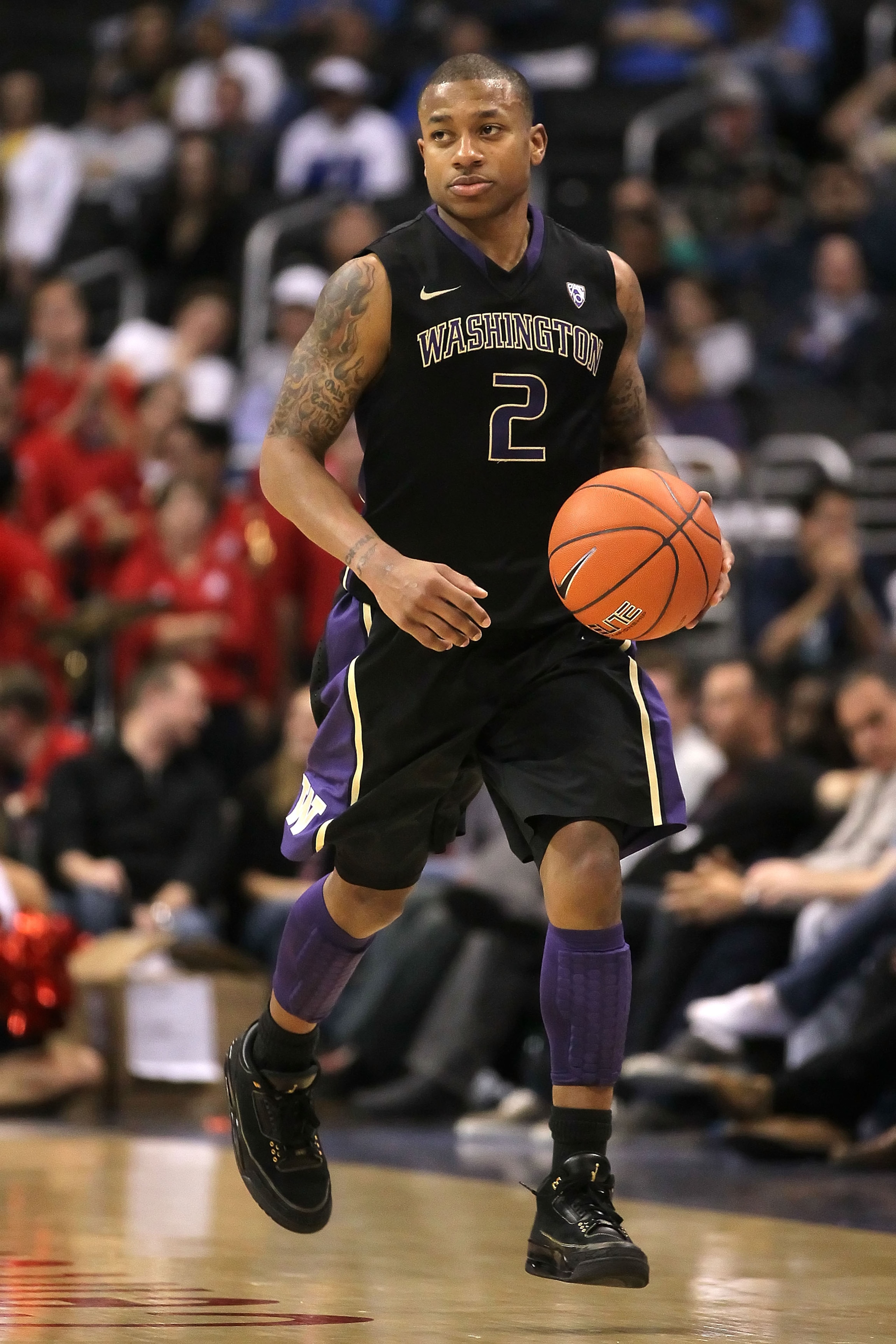 LOS ANGELES, CA - MARCH 12:  Isaiah Thomas #2 of the Washington Huskies moves the ball while taking on the Arizona Wildcats in the championship game of the 2011 Pacific Life Pac-10 Men's Basketball Tournament at Staples Center on March 12, 2011 in Los Ang