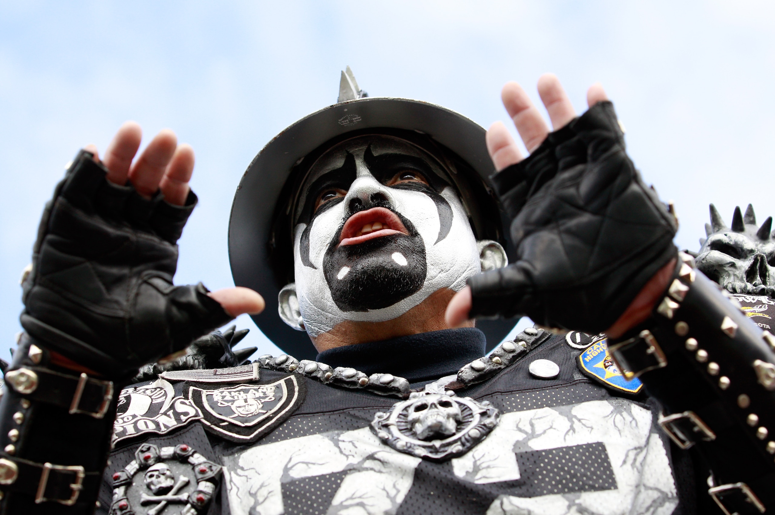 JACKSONVILLE, FL - DECEMBER 12:  A fan of the Oakland Raiders cheers during the game against the Jacksonville Jaguars at EverBank Field on December 12, 2010 in Jacksonville, Florida.  (Photo by Sam Greenwood/Getty Images)