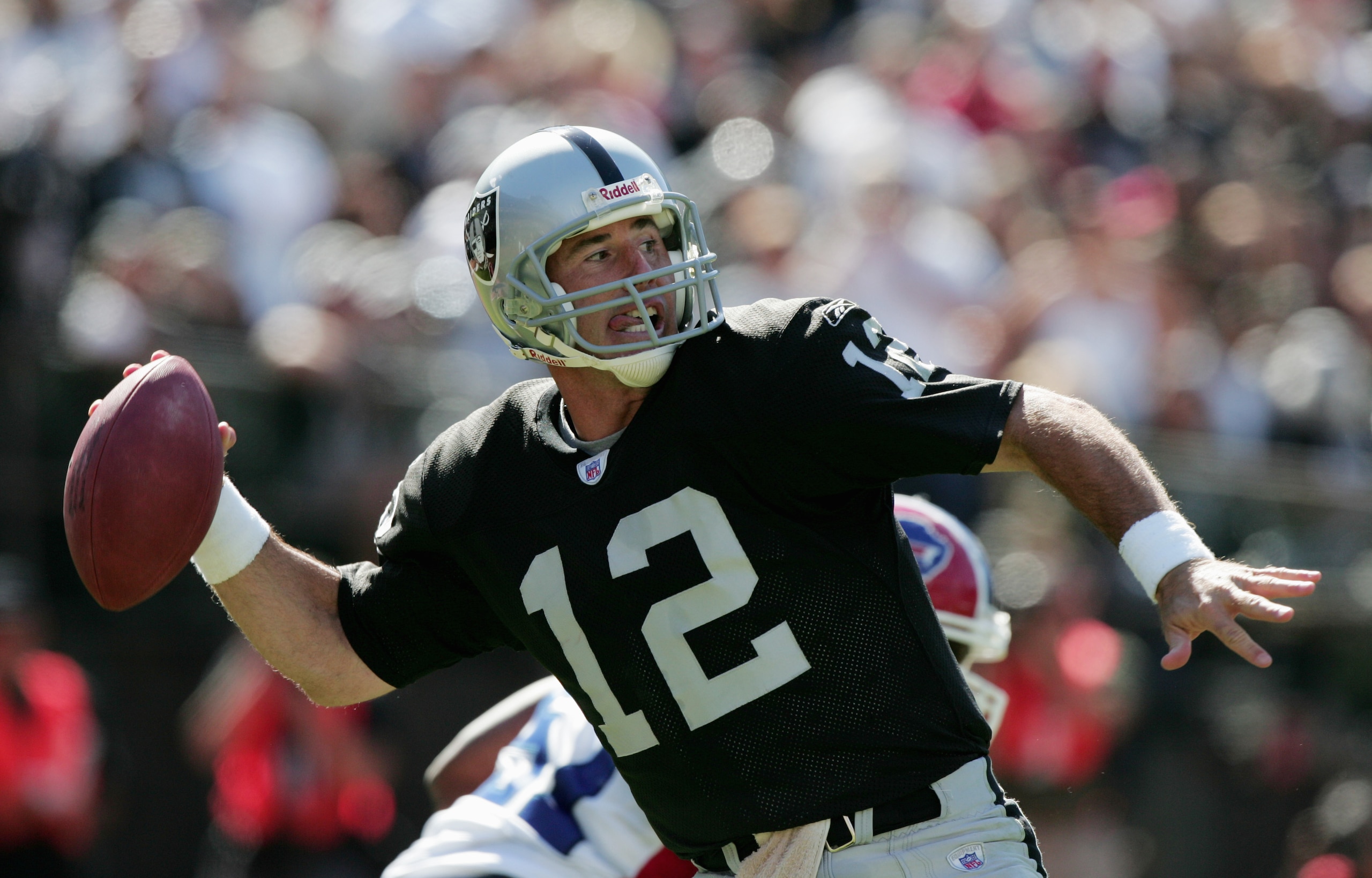 OAKLAND, CA - SEPTEMBER 19:  Quaterback Rich Gannon #12 of the Oakland Raiders passes the ball against the Buffalo Bills during the game at Network Associates Coliseum on September 19, 2004 in Oakland, California. The Raiders defeated the Bills 13-10. (Ph