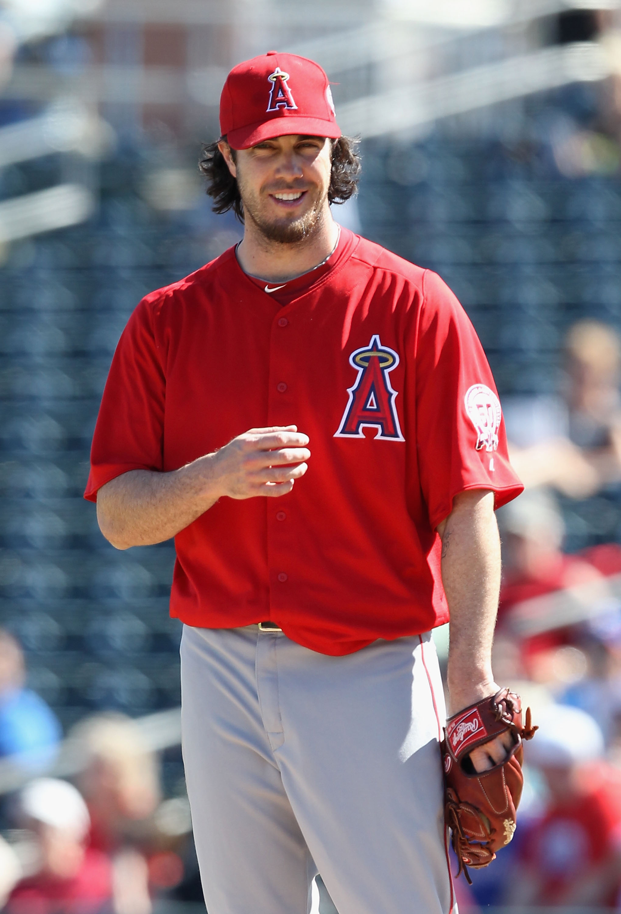 SURPRISE, AZ - MARCH 02:  Starting pitcher Dan Haren #24 of the Los Angeles Angels of Anaheim during the spring training game against the Texas Rangers at Surprise Stadium on March 2, 2011 in Surprise, Arizona.  (Photo by Christian Petersen/Getty Images)