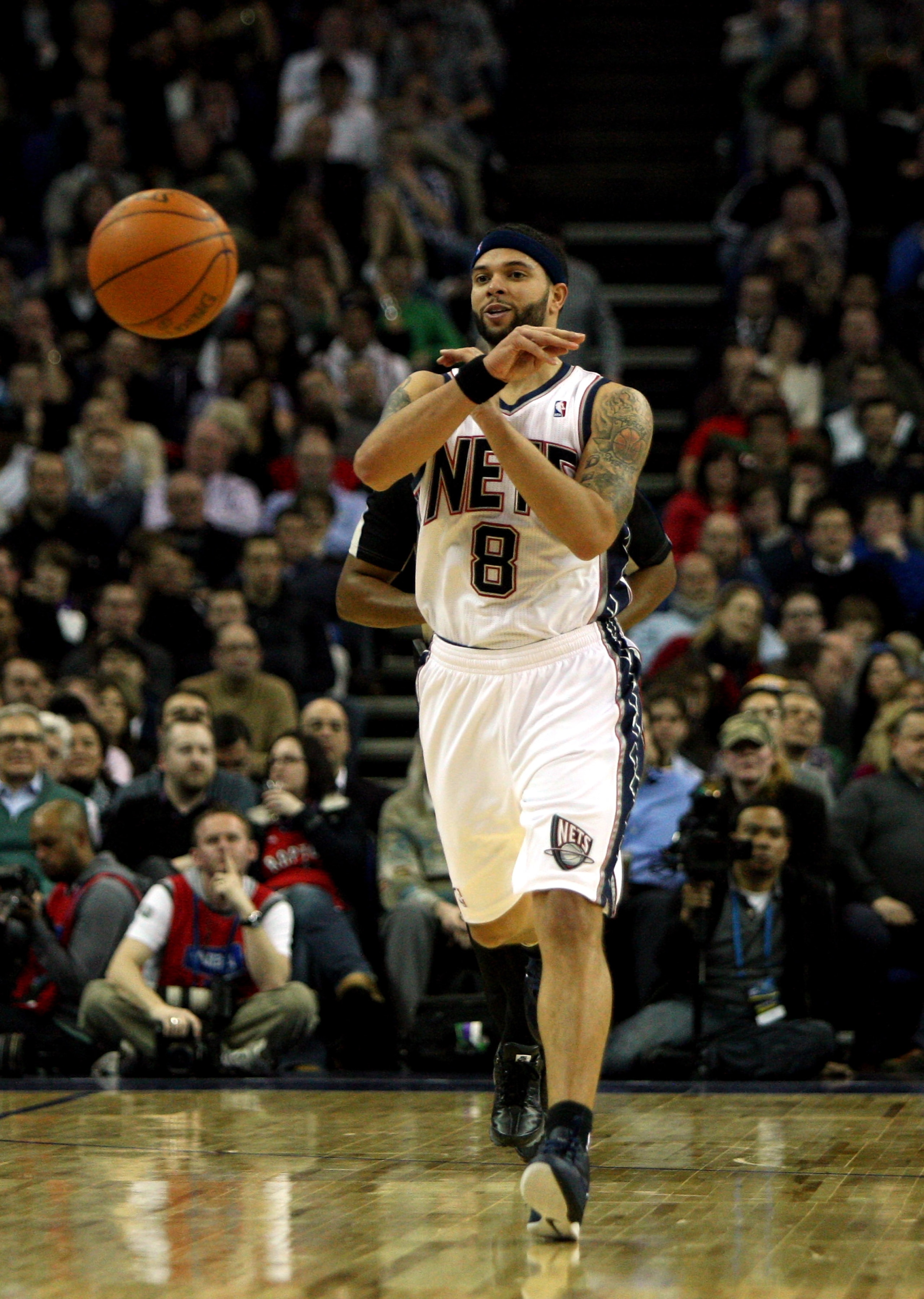 LONDON, ENGLAND - MARCH 04:  #8 Deron Williams of the Nets in action during the NBA match between New Jersey Nets and the Toronto Raptors at the O2 Arena on March 4, 2011 in London, England. NOTE TO USER: User expressly acknowledges and agrees that, by do