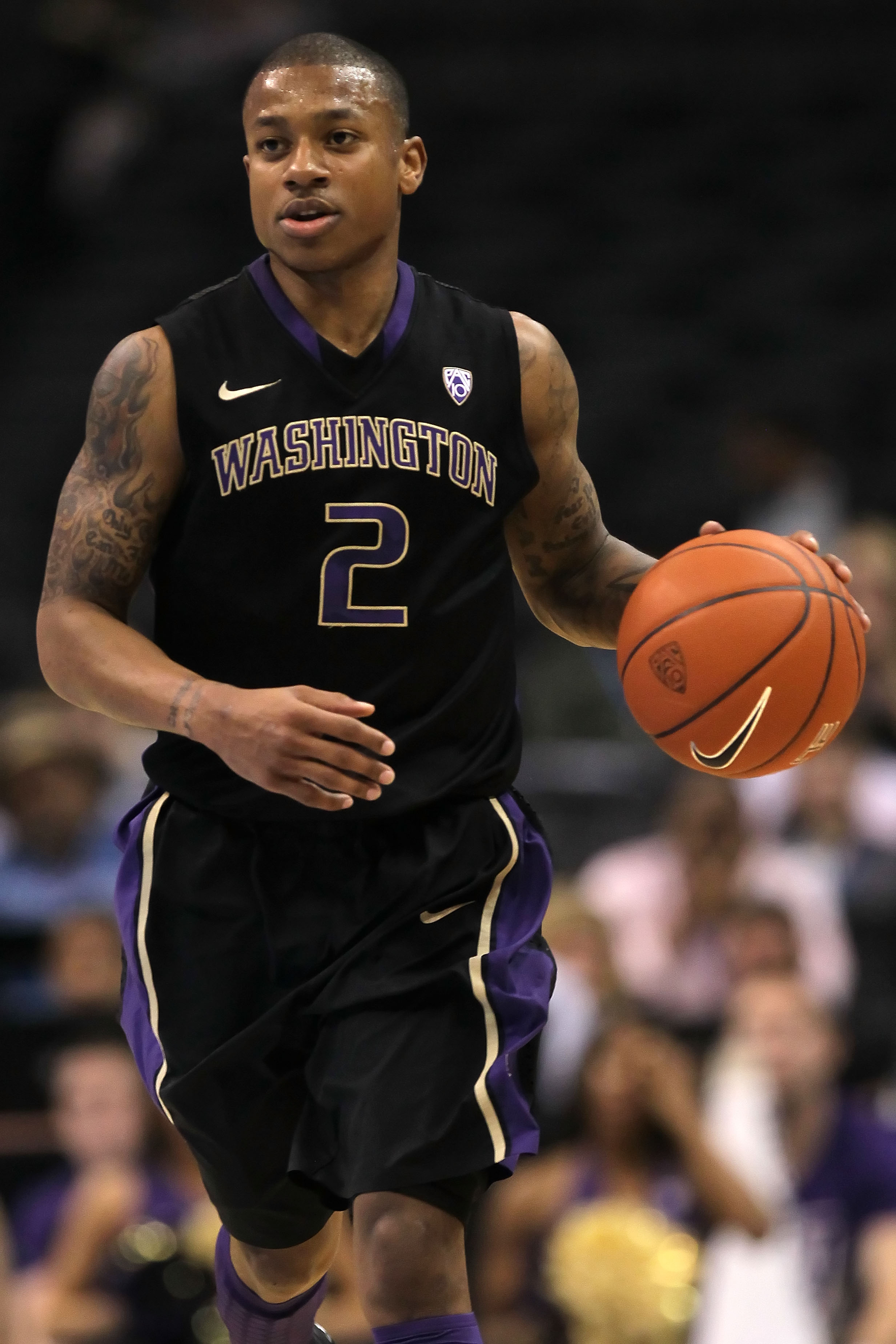 LOS ANGELES, CA - MARCH 12: Isaiah Thomas #2 of the Washington Huskies moves the ball while taking on the Arizona Wildcats in the championship game of the 2011 Pacific Life Pac-10 Men's Basketball Tournament at Staples Center on March 12, 2011 in Los Ang