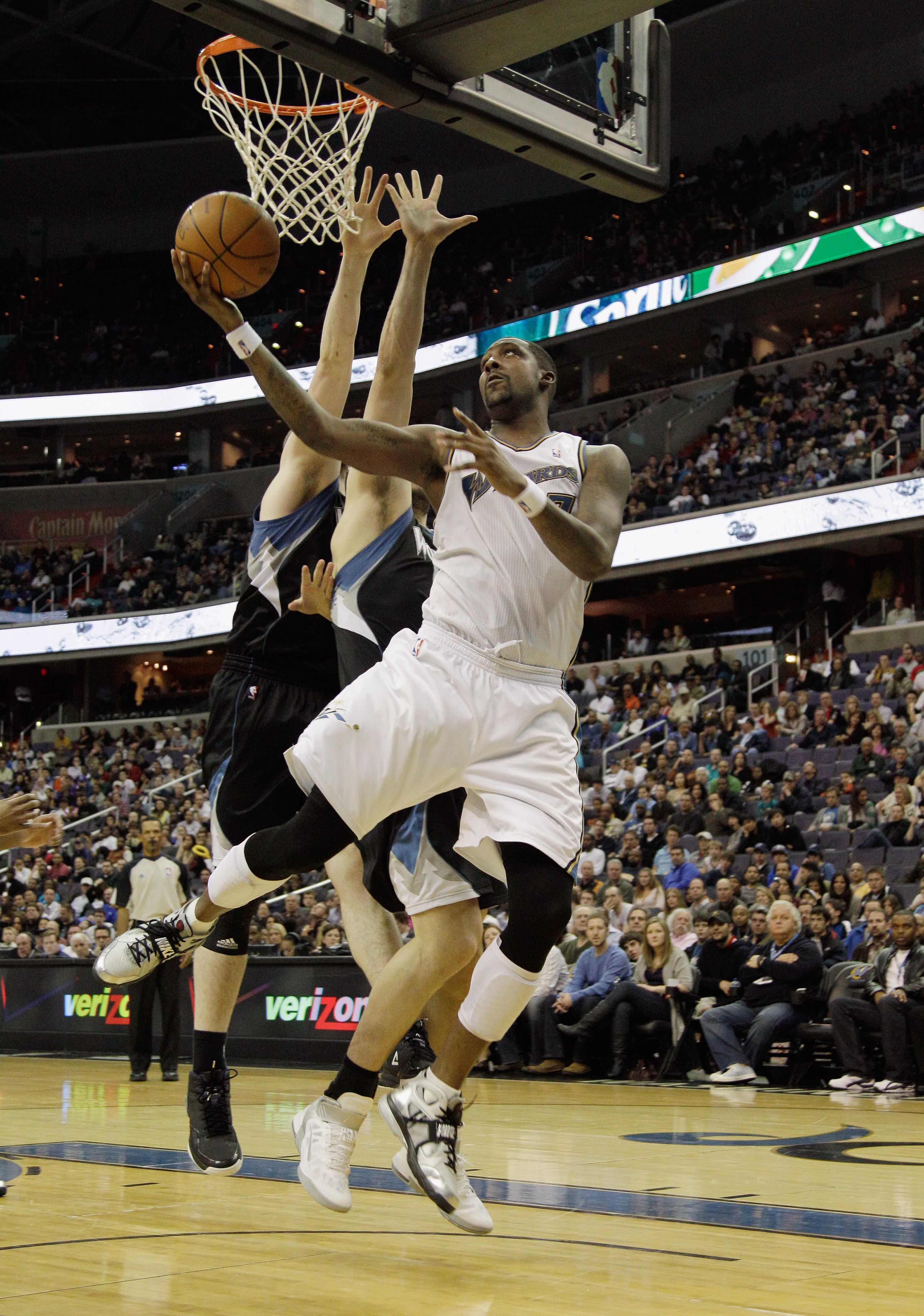 WASHINGTON, DC - MARCH 05:  Andray Blatche #7 of the Washington Wizards puts a shot against the Minnesota Timberwolves at the Verizon Center on March 5, 2011 in Washington, DC. NOTE TO USER: User expressly acknowledges and agrees that, by downloading and/