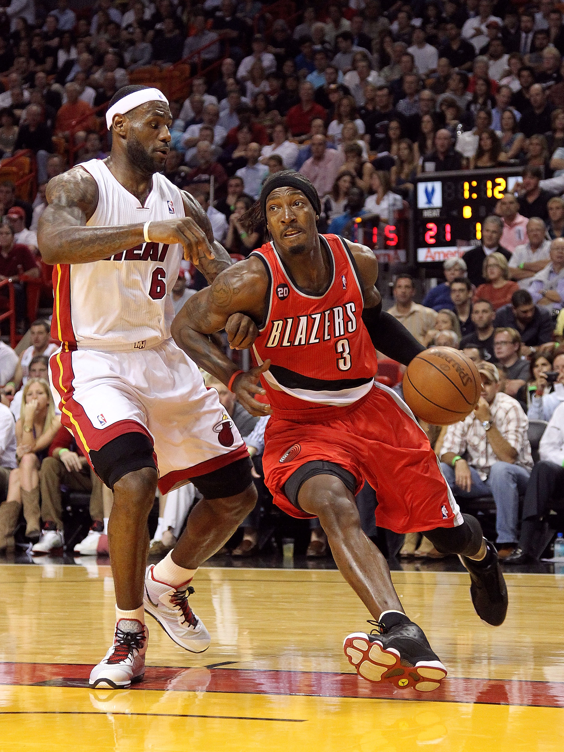 MIAMI, FL - MARCH 08:  Gerald Wallace #3 of the Portland Trail Blazers drives by LeBron James #6 of the Miami Heat during a game at American Airlines Arena on March 8, 2011 in Miami, Florida. NOTE TO USER: User expressly acknowledges and agrees that, by d