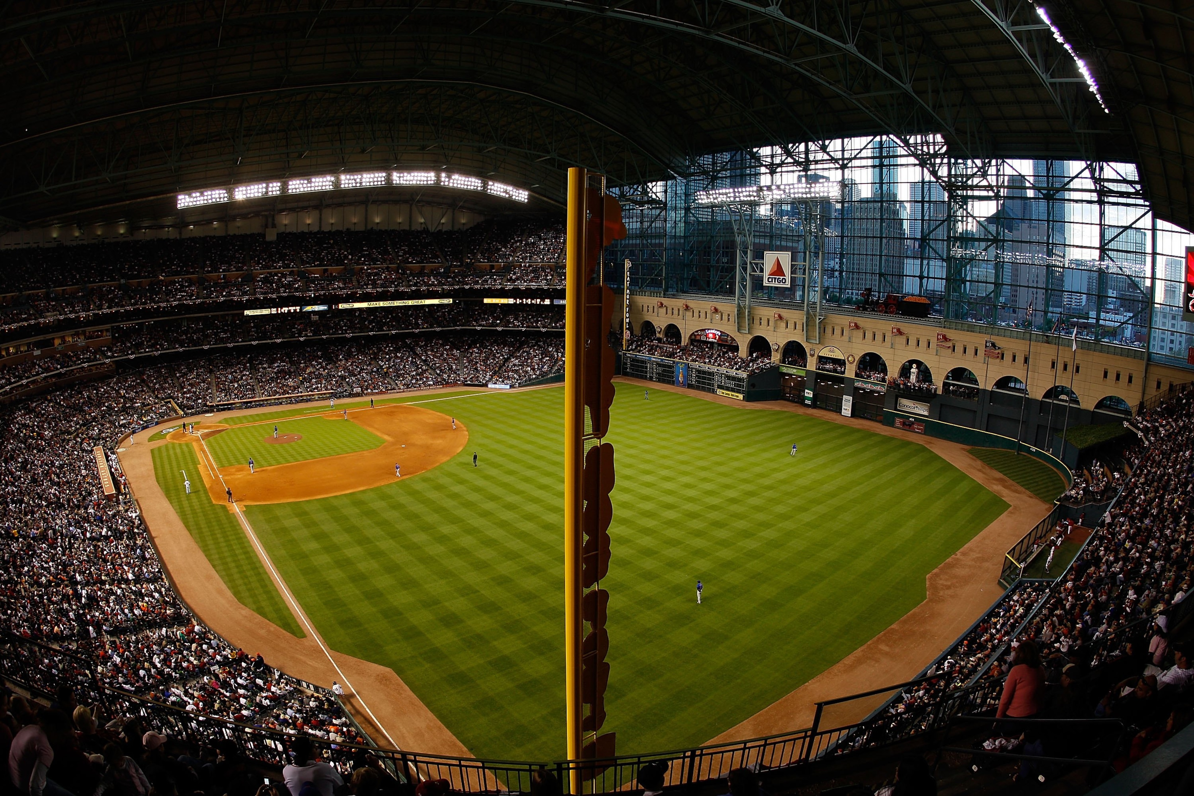 HOUSTON - APRIL 06: Fans watch the Opening Day game against the Chicago Cubs and the Houston Astros on April 6, 2009 at Minute Maid Park in Houston, Texas. (Photo by Chris Graythen/Getty Images) HOUSTON - APRIL 06: Fans watch the Opening Day game against the Chicago Cubs and the Houston Astros on April 6, 2009 at Minute Maid Park in Houston, Texas. (Photo by Chris Graythen/Getty Images)
