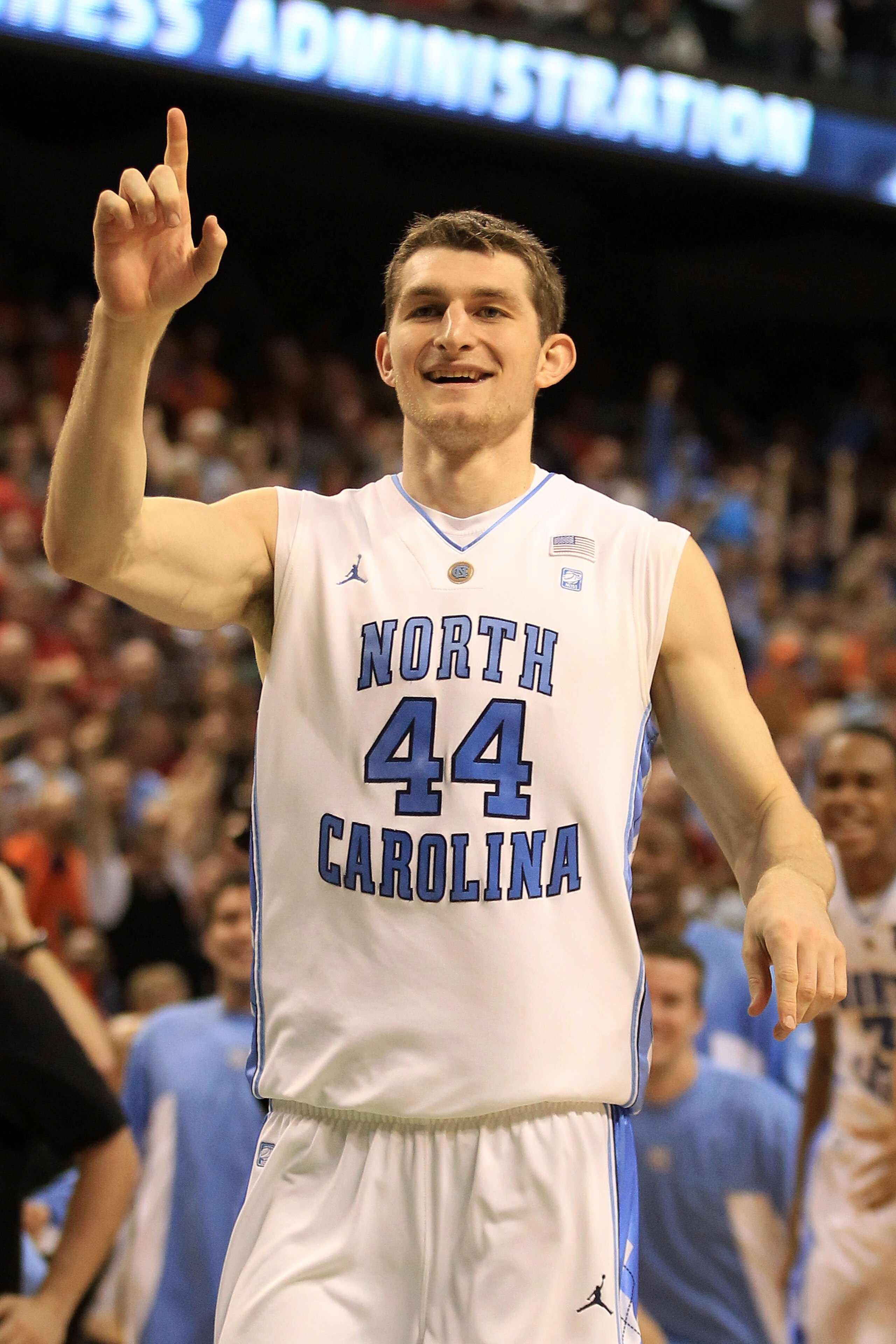 GREENSBORO, NC - MARCH 11: Tyler Zeller #44 of the North Carolina Tar Heels celebrates after defeating the Miami Hurricanes 61-59 during the second half in the quarterfinals of the 2011 ACC men's basketball tournament at the Greensboro Coliseum on March GREENSBORO, NC - MARCH 11: Tyler Zeller #44 of the North Carolina Tar Heels celebrates after defeating the Miami Hurricanes 61-59 during the second half in the quarterfinals of the 2011 ACC men's basketball tournament at the Greensboro Coliseum on March