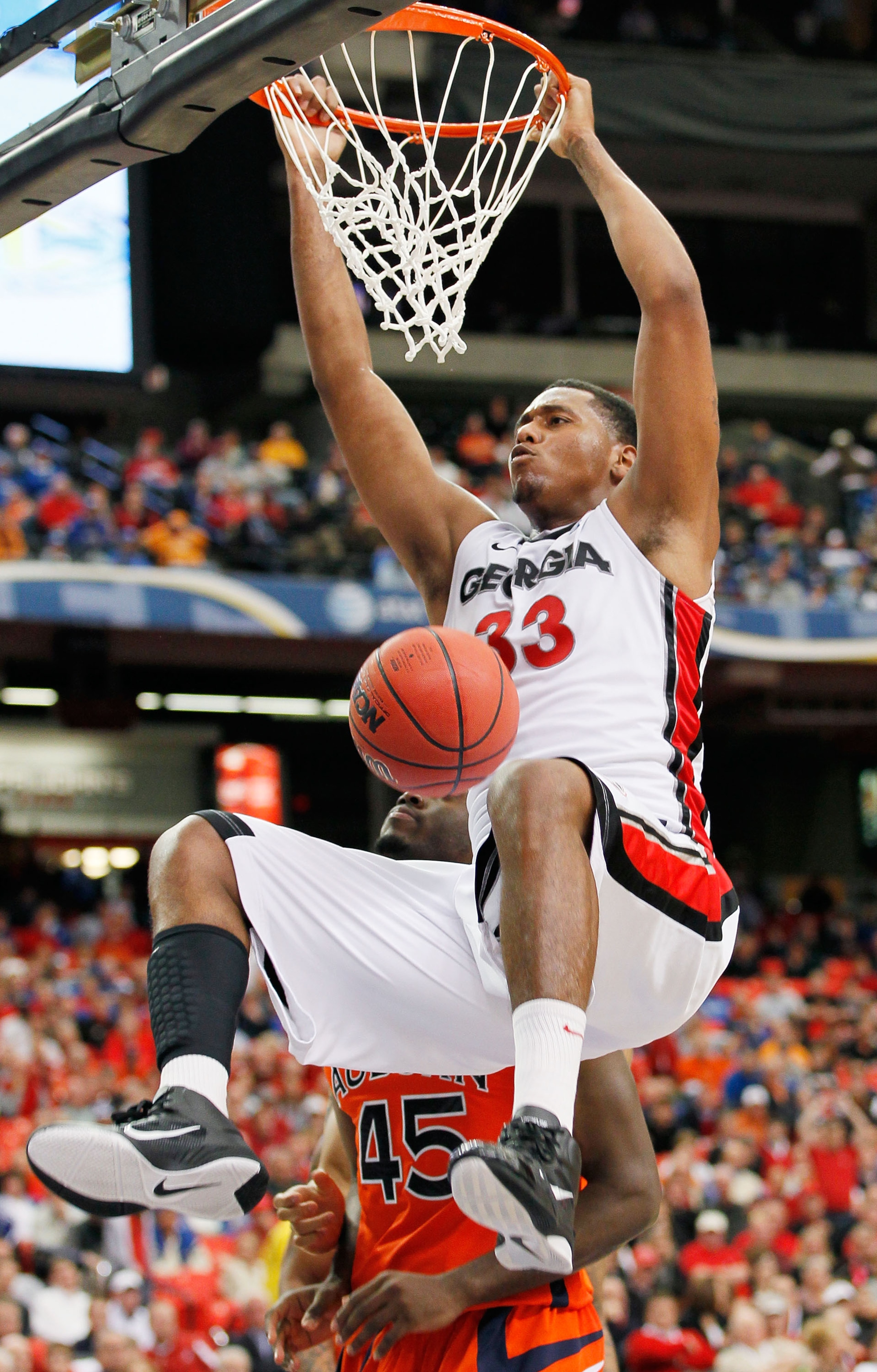 ATLANTA, GA - MARCH 10: Trey Thompkins #33 of the Georgia Bulldogs dunks against the Auburn Tigers during the first round of the SEC Men's Basketball Tournament at the Georgia Dome on March 10, 2011 in Atlanta, Georgia. (Photo by Kevin C. Cox/Getty Imag ATLANTA, GA - MARCH 10: Trey Thompkins #33 of the Georgia Bulldogs dunks against the Auburn Tigers during the first round of the SEC Men's Basketball Tournament at the Georgia Dome on March 10, 2011 in Atlanta, Georgia. (Photo by Kevin C. Cox/Getty Imag