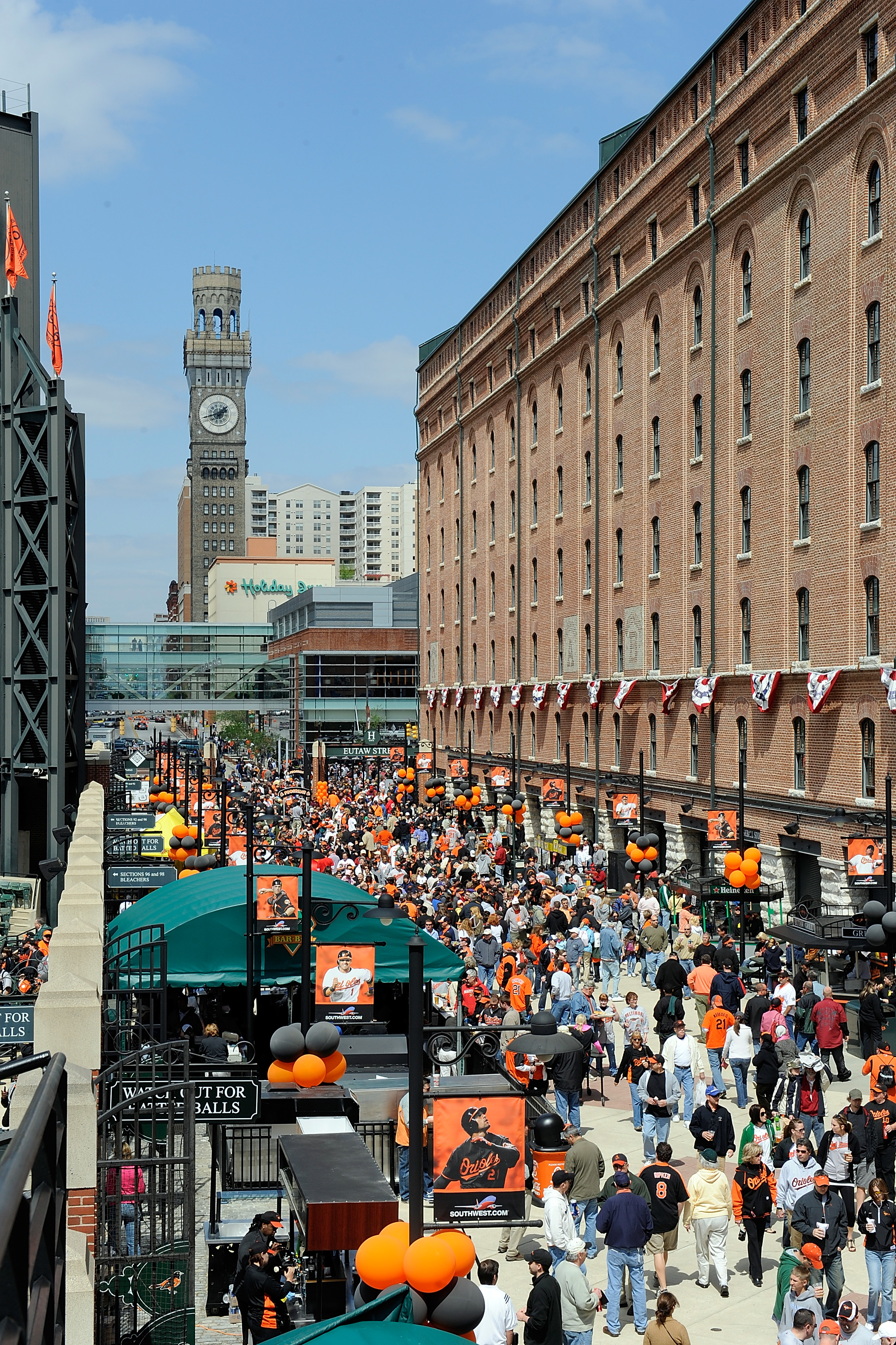 BALTIMORE - APRIL 09:  Fans walk down Eutaw Street before the game between the Baltimore Orioles and the Toronto Blue Jays on Opening Day at Camden Yards on April 9, 2010 in Baltimore, Maryland.  (Photo by Greg Fiume/Getty Images)