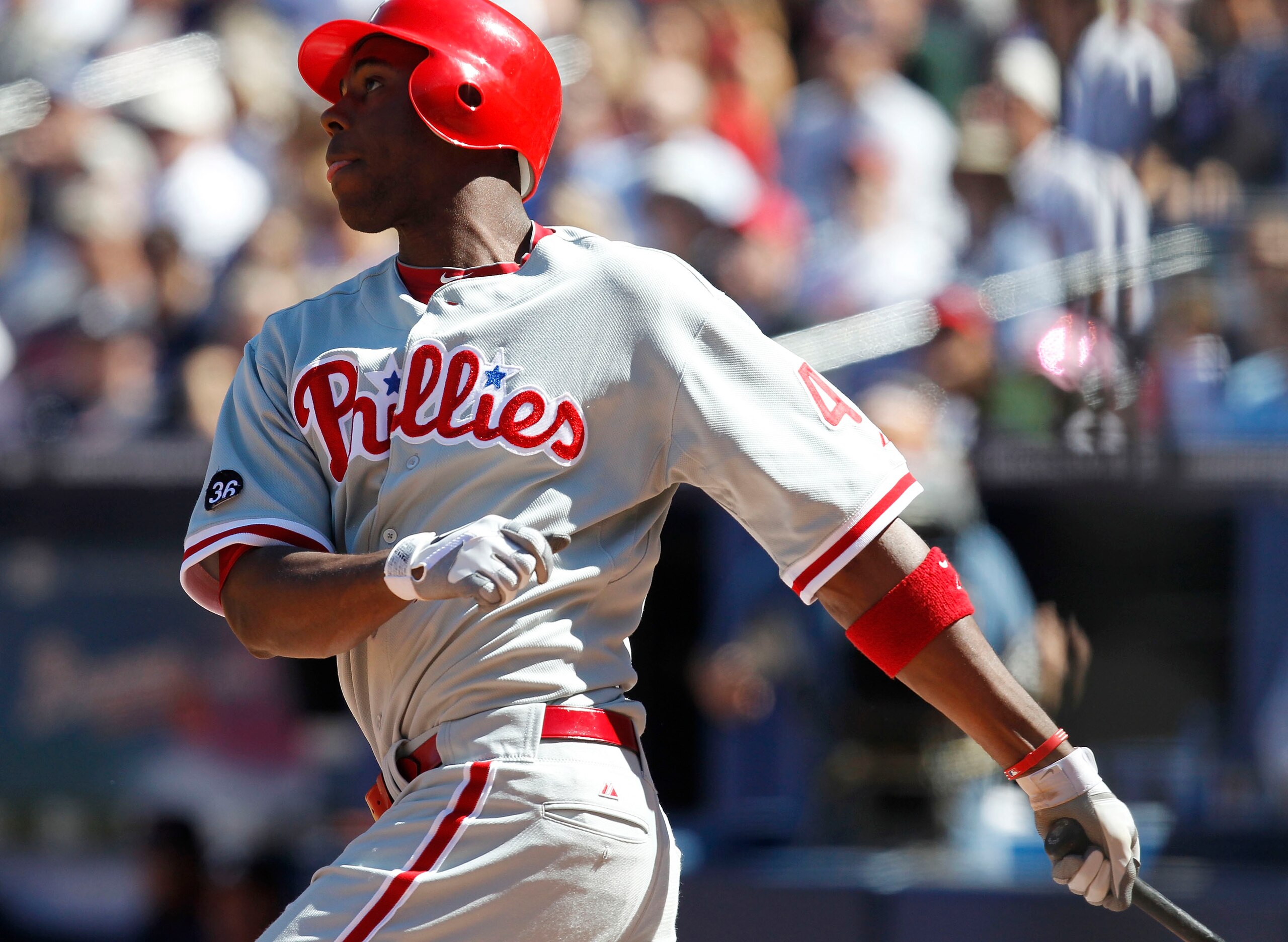 ATLANTA - OCTOBER 3:  Outfielder John Mayberry #40 of the Philadelphia Phillies hits a two run pinch hit home run during the game against the Atlanta Braves at Turner Field on October 3, 2010 in Atlanta, Georgia. The Braves beat the Phillies 8-7.  (Photo