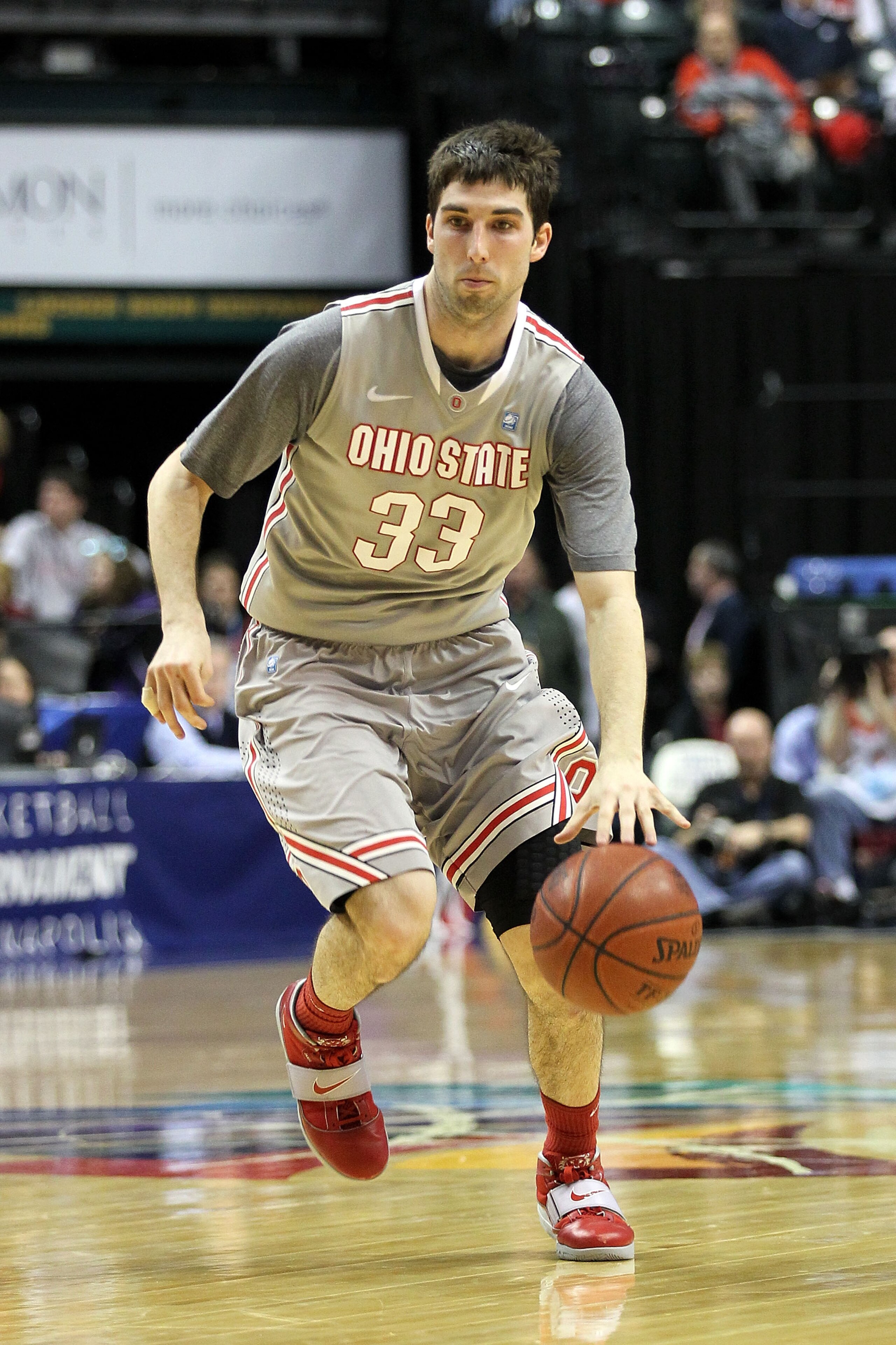INDIANAPOLIS, IN - MARCH 13:  Jon Diebler #33 of the Ohio State Buckeyes drives against the Penn State Nittany Lions during the championship game of the 2011 Big Ten Men's Basketball Tournament at Conseco Fieldhouse on March 13, 2011 in Indianapolis, Indi