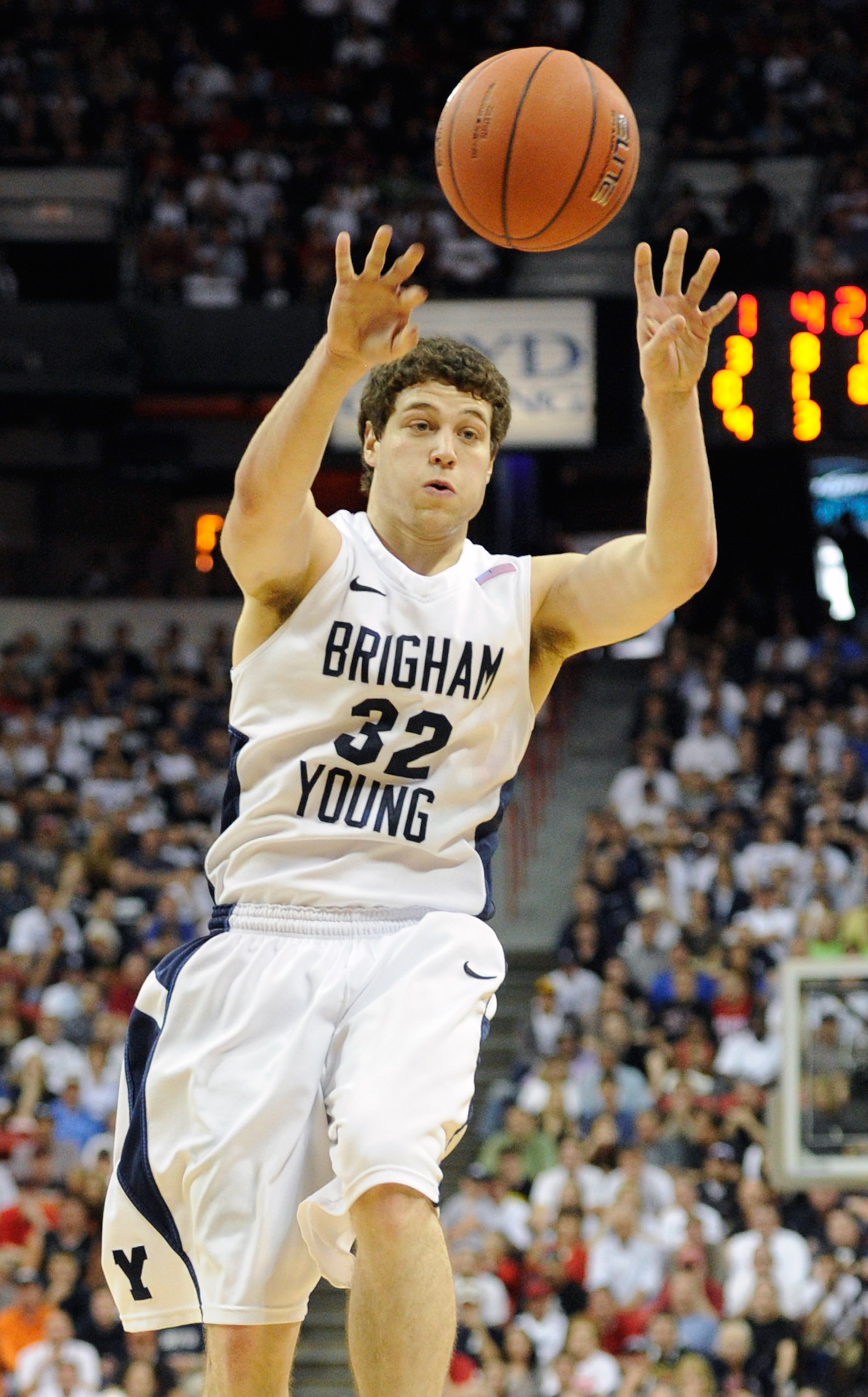 LAS VEGAS, NV - MARCH 12: Jimmer Fredette #32 of the Brigham Young University Cougars passes the ball during the championship game of the Conoco Mountain West Conference Basketball tournament against the San Diego State Aztecs at the Thomas & Mack Center LAS VEGAS, NV - MARCH 12: Jimmer Fredette #32 of the Brigham Young University Cougars passes the ball during the championship game of the Conoco Mountain West Conference Basketball tournament against the San Diego State Aztecs at the Thomas & Mack Center