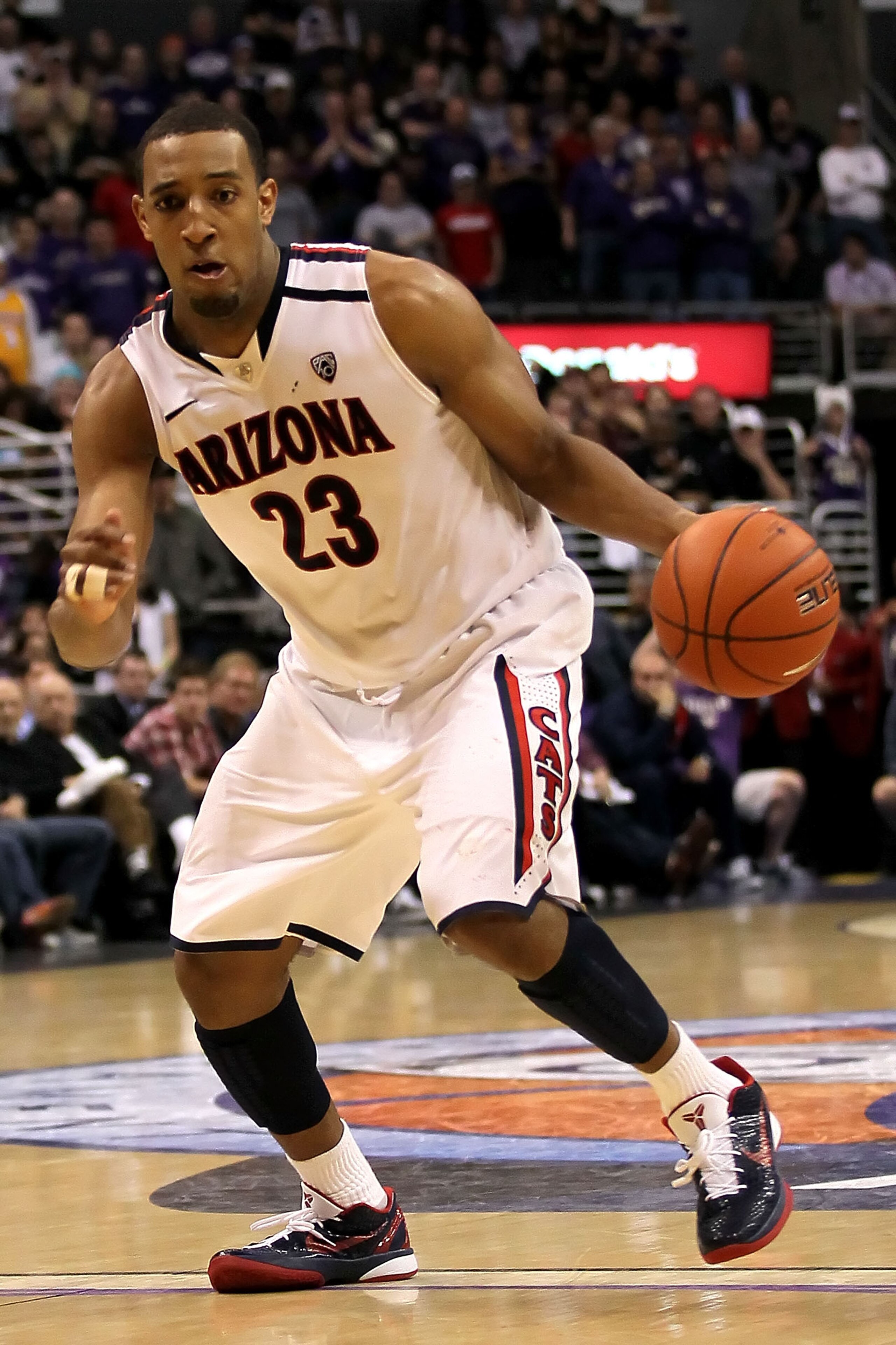 LOS ANGELES, CA - MARCH 12: Derrick Williams #23 of the Arizona Wildcats moves the ball while taking on the Washington Huskies in the championship game of the 2011 Pacific Life Pac-10 Men's Basketball Tournament at Staples Center on March 12, 2011 in Los LOS ANGELES, CA - MARCH 12: Derrick Williams #23 of the Arizona Wildcats moves the ball while taking on the Washington Huskies in the championship game of the 2011 Pacific Life Pac-10 Men's Basketball Tournament at Staples Center on March 12, 2011 in Los