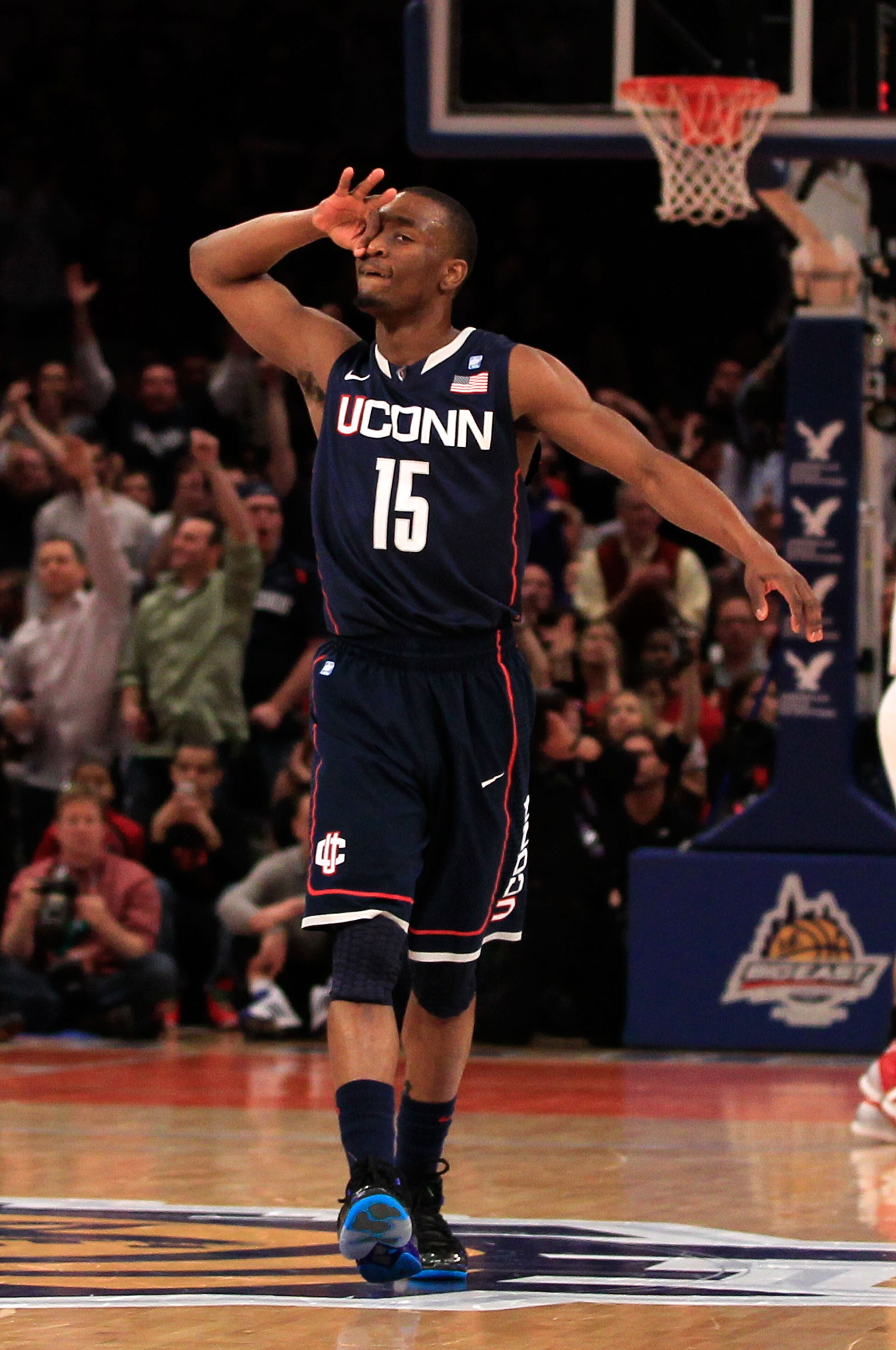 NEW YORK, NY - MARCH 12: Kemba Walker #15 of the Connecticut Huskies reacts after a play against the Louisville Cardinals during the championship of the 2011 Big East Men's Basketball Tournament presented by American Eagle Outfitters at Madison Square Ga NEW YORK, NY - MARCH 12: Kemba Walker #15 of the Connecticut Huskies reacts after a play against the Louisville Cardinals during the championship of the 2011 Big East Men's Basketball Tournament presented by American Eagle Outfitters at Madison Square Ga