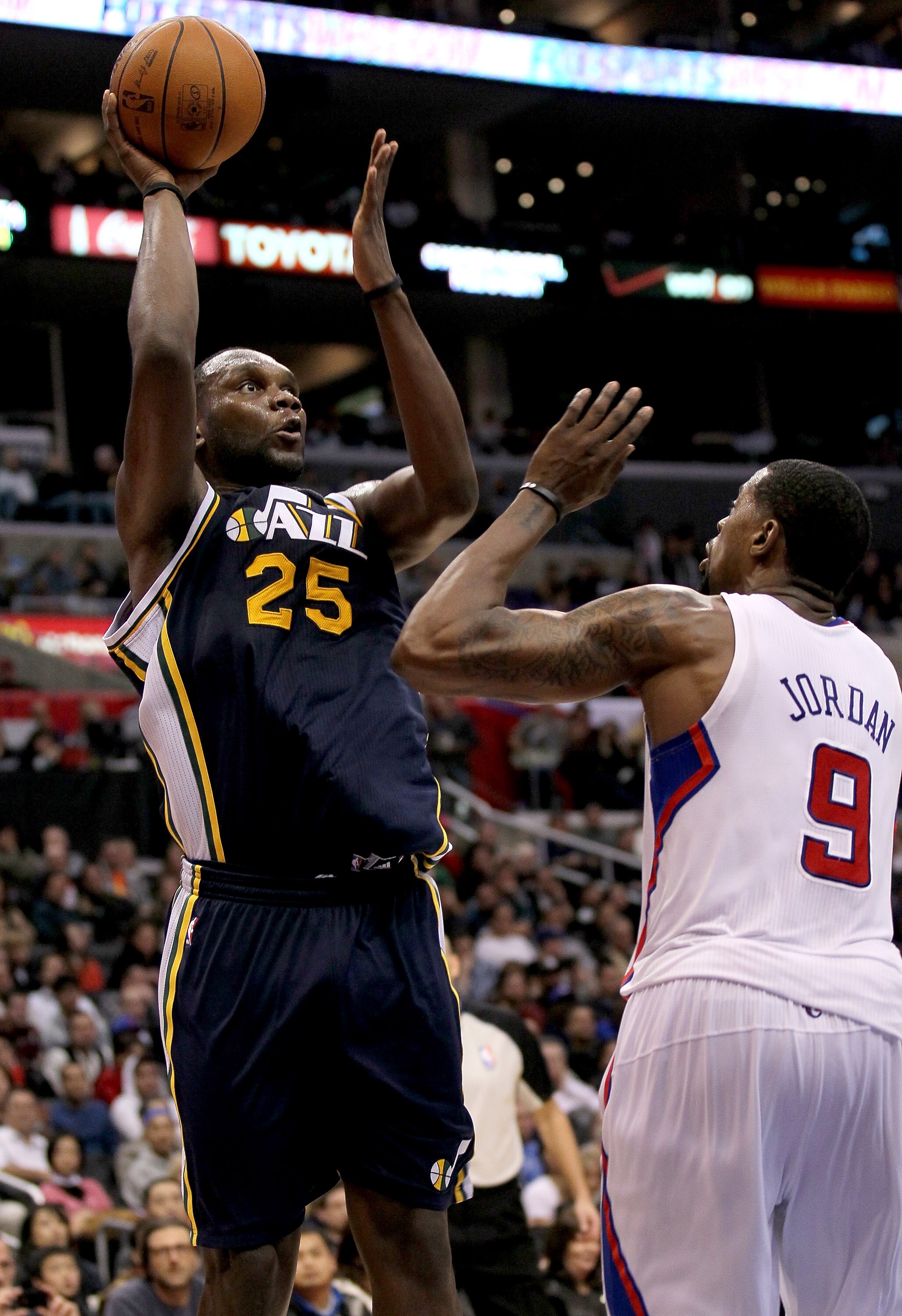LOS ANGELES, CA - DECEMBER 29:  Al Jefferson #25 of the Utah Jazz shoots over DeAndre Jordan #9 of the Los Angeles Clippers at Staples Center on December 29, 2010 in Los Angeles, California.   The Jazz won 103-85.  NOTE TO USER: User expressly acknowledge