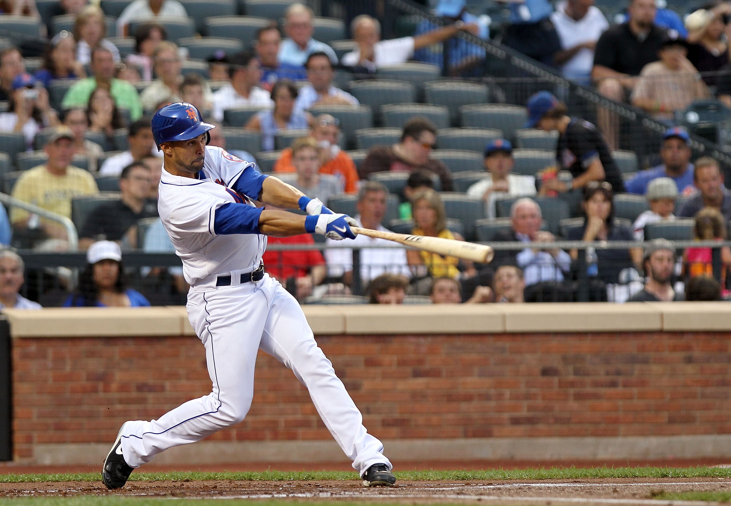 NEW YORK - AUGUST 11:  Angel Pagan #16 of the New York Mets hits a two run home run in the first inning against the Colorado Rockies at Citi Field on August 11, 2010 in the Flushing neighborhood of the Queens borough of New York City.  (Photo by Nick Laha