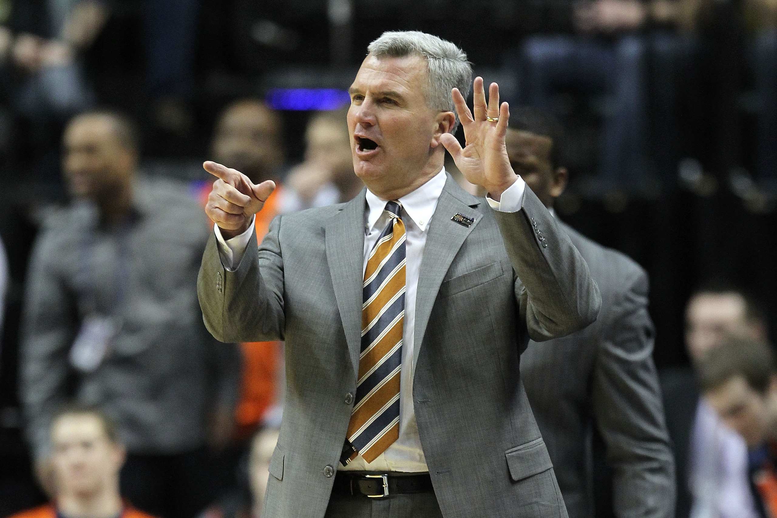 INDIANAPOLIS, IN - MARCH 11:  Head coach Bruce Weber of the Illinois Fighting Illini coaches against the Michigan Wolverines during the quarterfinals of the 2011 Big Ten Men's Basketball Tournament at Conseco Fieldhouse on March 11, 2011 in Indianapolis,