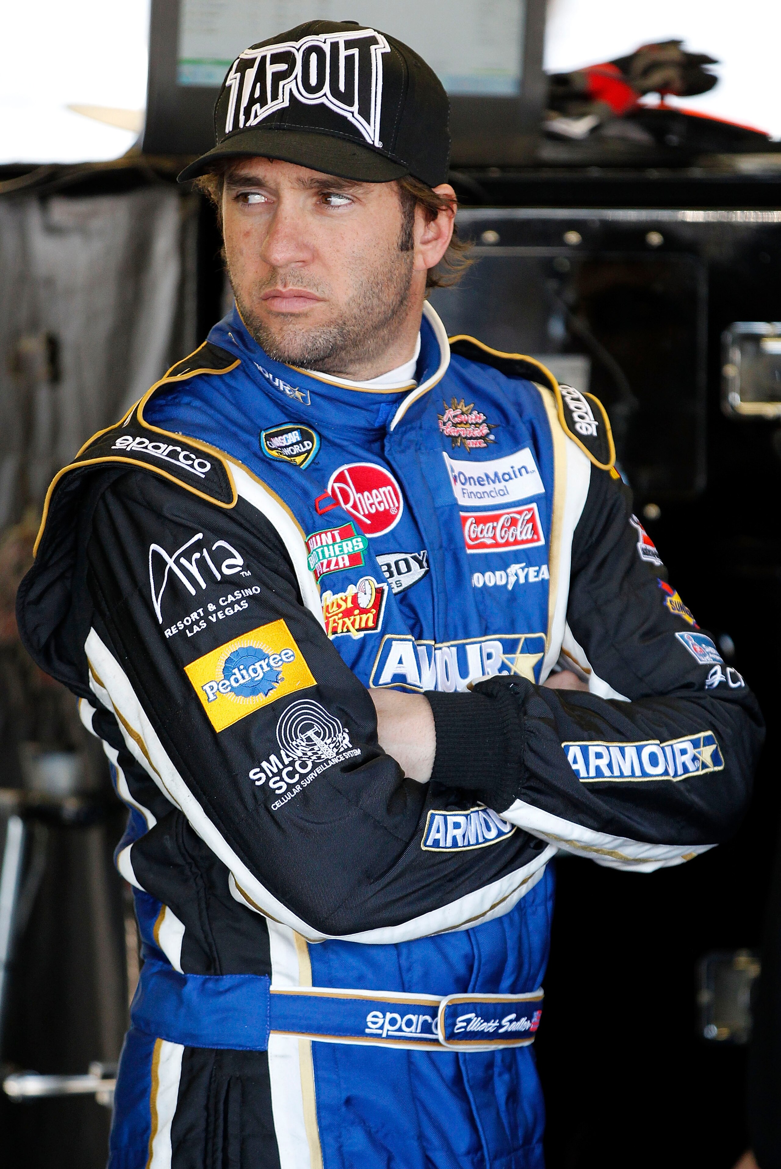 DARLINGTON, SC - MARCH 12:  Elliott Sadler, driver of the #2 Armour Vienna Sausages Chevrolet, stands in the garage during practice for the Too Tough to Tame 200 at Darlington Raceway on March 12, 2011 in Darlington, South Carolina.  (Photo by Geoff Burke