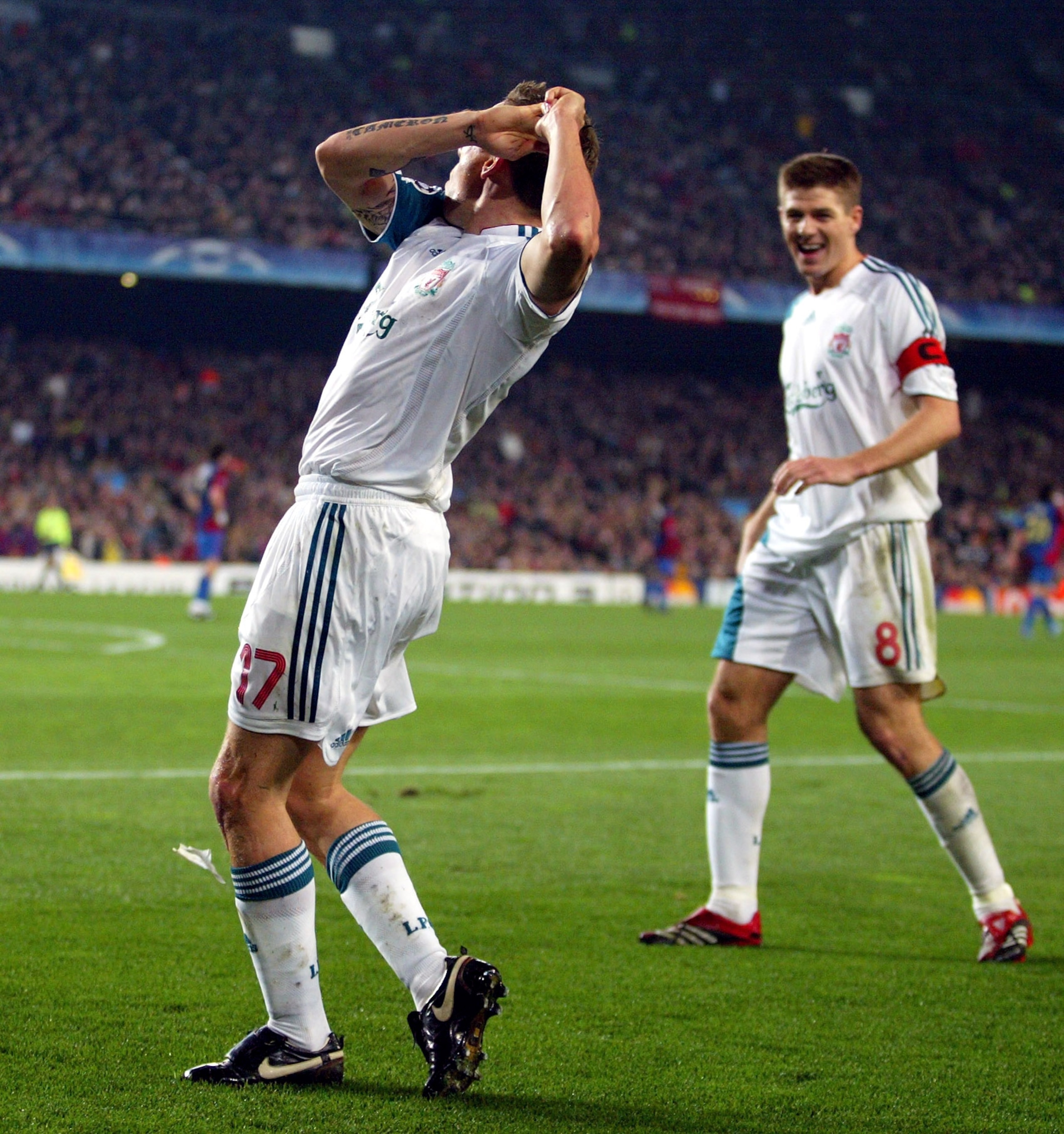 BARCELONA, SPAIN - FEBRUARY 21:  Craig Bellamy of Liverpool celebrates with a 'golf swing' after scoring his goal during the UEFA Champions League Round of 16 first leg match between Barcelona and Liverpool at the Nou Camp Stadium on February 21, 2007 in