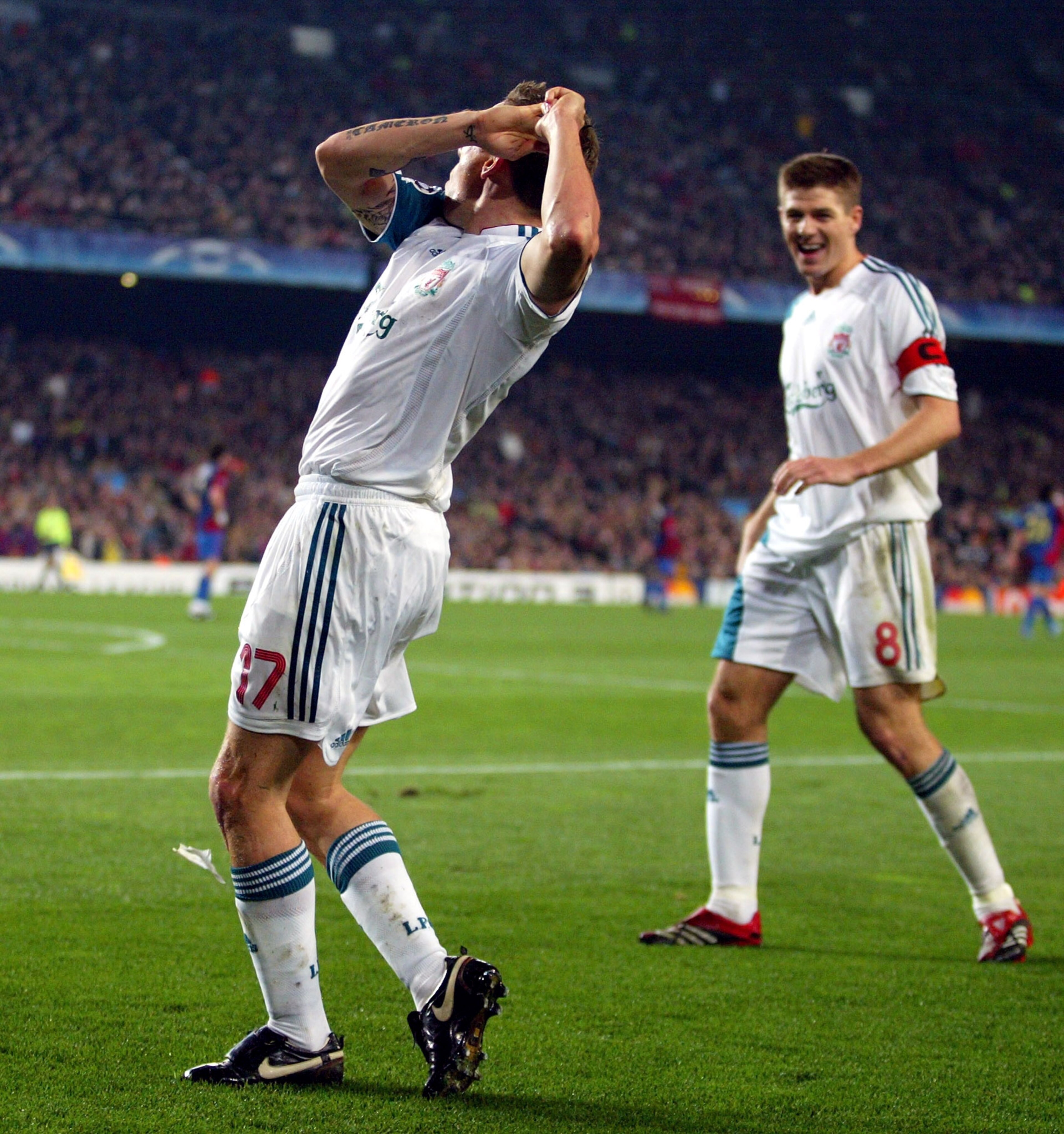BARCELONA, SPAIN - FEBRUARY 21:  Craig Bellamy of Liverpool celebrates with a 'golf swing' after scoring his goal during the UEFA Champions League Round of 16 first leg match between Barcelona and Liverpool at the Nou Camp Stadium on February 21, 2007 in