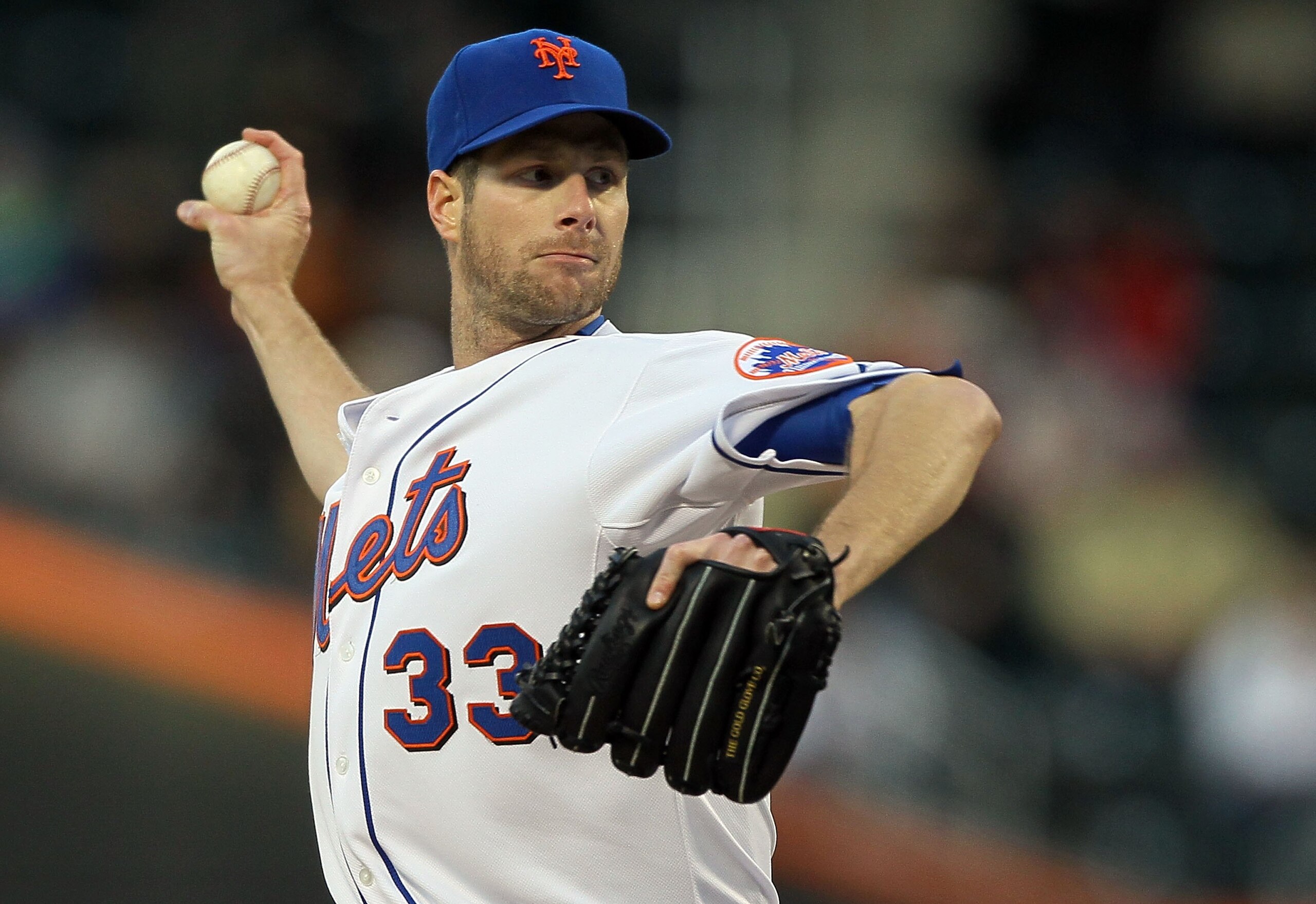 NEW YORK - MAY 10:  John Maine #33 of the New York Mets delivers a pitch against the Washington Nationals on May 10, 2010 at Citi Field in the Flushing neighborhood of the Queens borough of New York City.  (Photo by Jim McIsaac/Getty Images)
