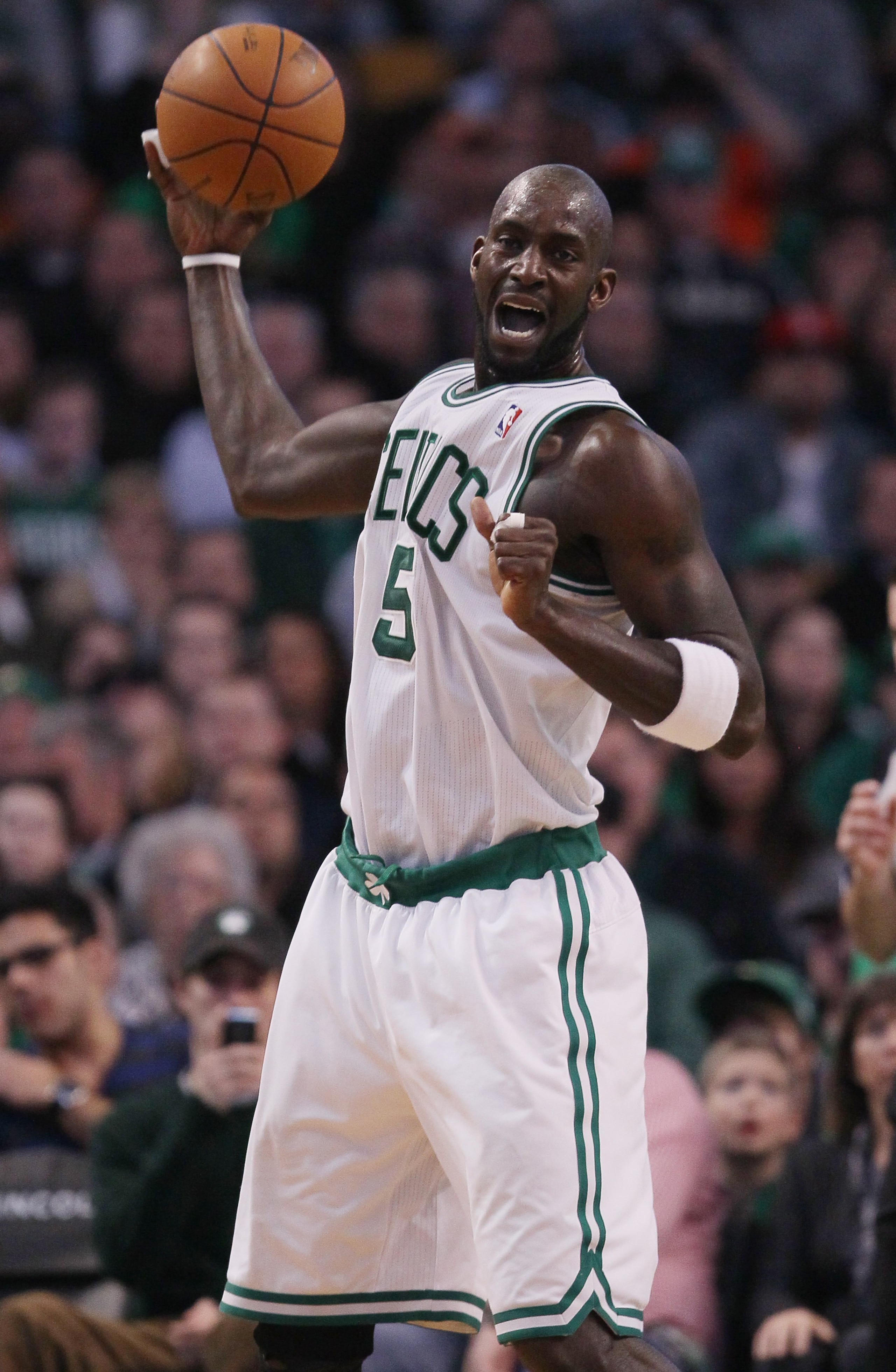 BOSTON, MA - MARCH 02:  Kevin Garnett #5 of the Boston Celtics gets the ball in the second half against the Phoenix Suns on March 2, 2011 at the TD Garden in Boston, Massachusetts.  The Celtics defeated the Suns 115-103. NOTE TO USER: User expressly ackno