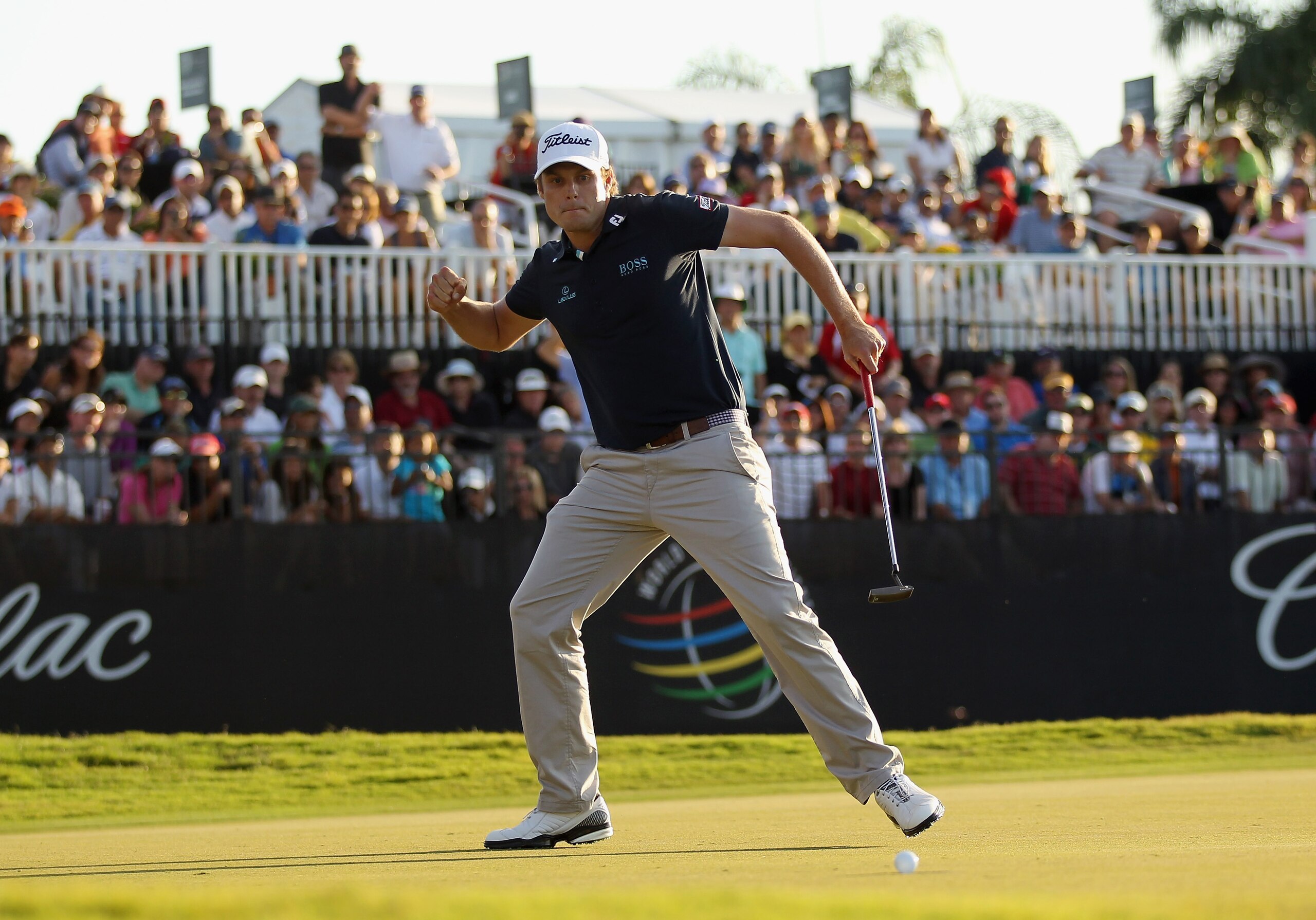 DORAL, FL - MARCH 13:  Nick Watney celebrates his birdie putt on the 18th green during the final round of the 2011 WGC- Cadillac Championship at the TPC Blue Monster at the Doral Golf Resort and Spa on March 13, 2011 in Doral, Florida.  (Photo by Mike Ehr
