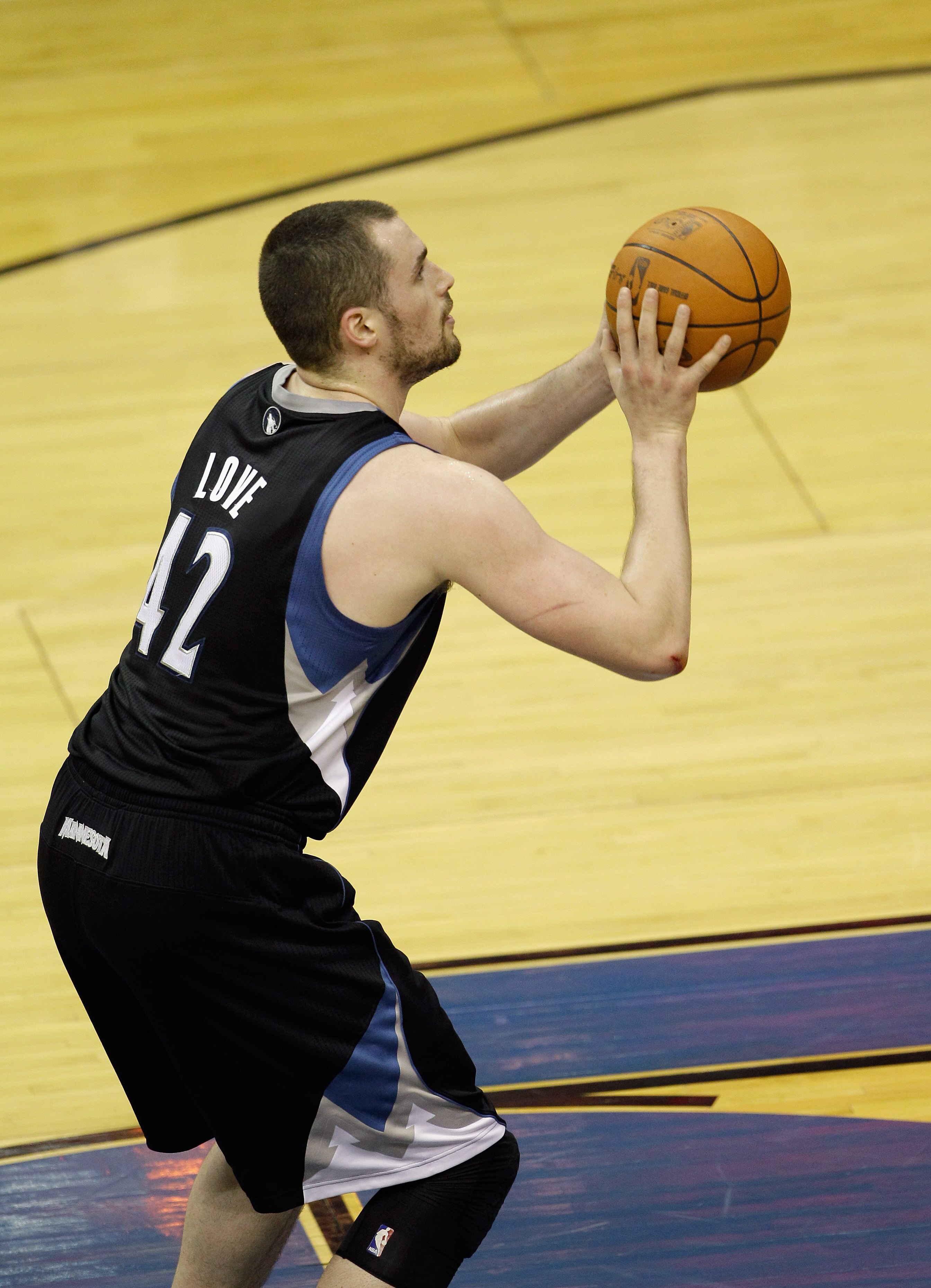 WASHINGTON, DC - MARCH 05:  Kevin Love #42 of the Minnesota Timberwolves against the Washington Wizards at the Verizon Center on March 5, 2011 in Washington, DC. NOTE TO USER: User expressly acknowledges and agrees that, by downloading and/or using this P