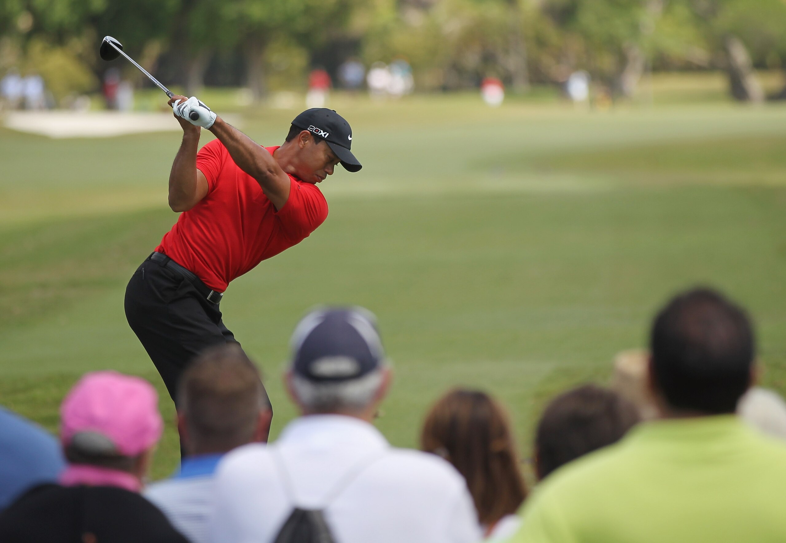 DORAL, FL - MARCH 13:  Tiger Woods hits his tee shot on the third hole during the final round of the 2011 WGC- Cadillac Championship at the TPC Blue Monster at the Doral Golf Resort and Spa on March 13, 2011 in Doral, Florida.  (Photo by Mike Ehrmann/Gett