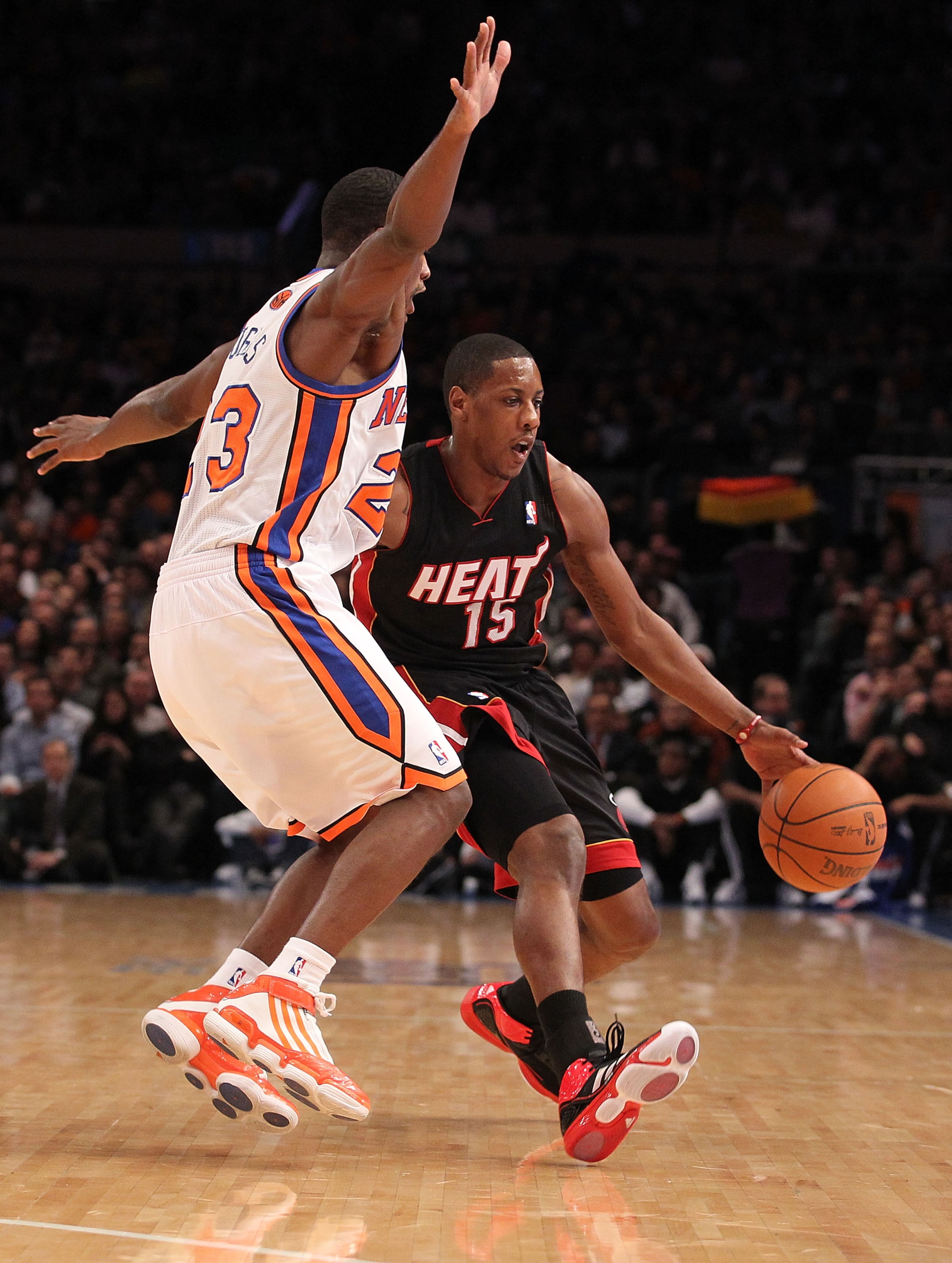 NEW YORK - DECEMBER 17: Mario Chalmers #15 of the Miami Heat in dribbles against Toney Douglas #23 of the New York Knicks at Madison Square Garden on December 17, 2010 in New York, New York. (Photo by Al Bello/Getty Images) NEW YORK - DECEMBER 17: Mario Chalmers #15 of the Miami Heat in dribbles against Toney Douglas #23 of the New York Knicks at Madison Square Garden on December 17, 2010 in New York, New York. (Photo by Al Bello/Getty Images)