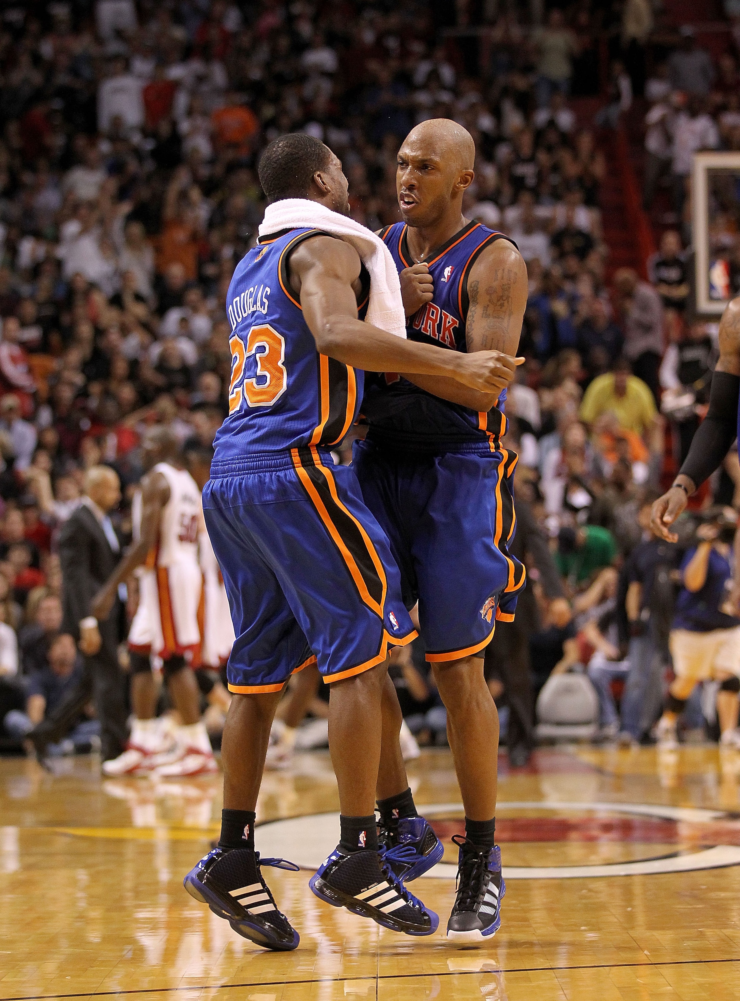 MIAMI, FL - FEBRUARY 27: Chauncey Billups #4 of the New York Knicks is congratulated by teammate Toney Douglas #23 during a game against the Miami Heat at American Airlines Arena on February 27, 2011 in Miami, Florida. NOTE TO USER: User expressly acknow MIAMI, FL - FEBRUARY 27: Chauncey Billups #4 of the New York Knicks is congratulated by teammate Toney Douglas #23 during a game against the Miami Heat at American Airlines Arena on February 27, 2011 in Miami, Florida. NOTE TO USER: User expressly acknow