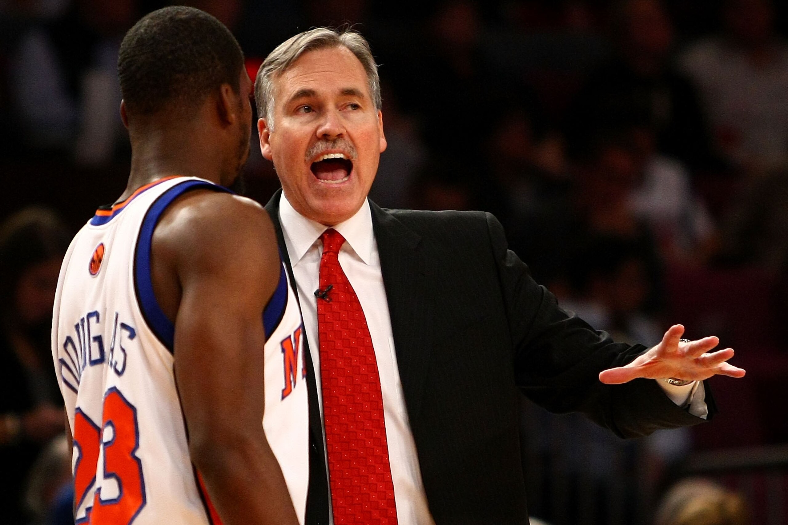 NEW YORK - NOVEMBER 06: Head coach Mike D'Antoni of the New York Knicks talks with Toney Douglas #23 during a time out against the Cleveland Cavaliers at Madison Square Garden November 6, 2009 in New York City. NOTE TO USER: User expressly acknowledges a NEW YORK - NOVEMBER 06: Head coach Mike D'Antoni of the New York Knicks talks with Toney Douglas #23 during a time out against the Cleveland Cavaliers at Madison Square Garden November 6, 2009 in New York City. NOTE TO USER: User expressly acknowledges a