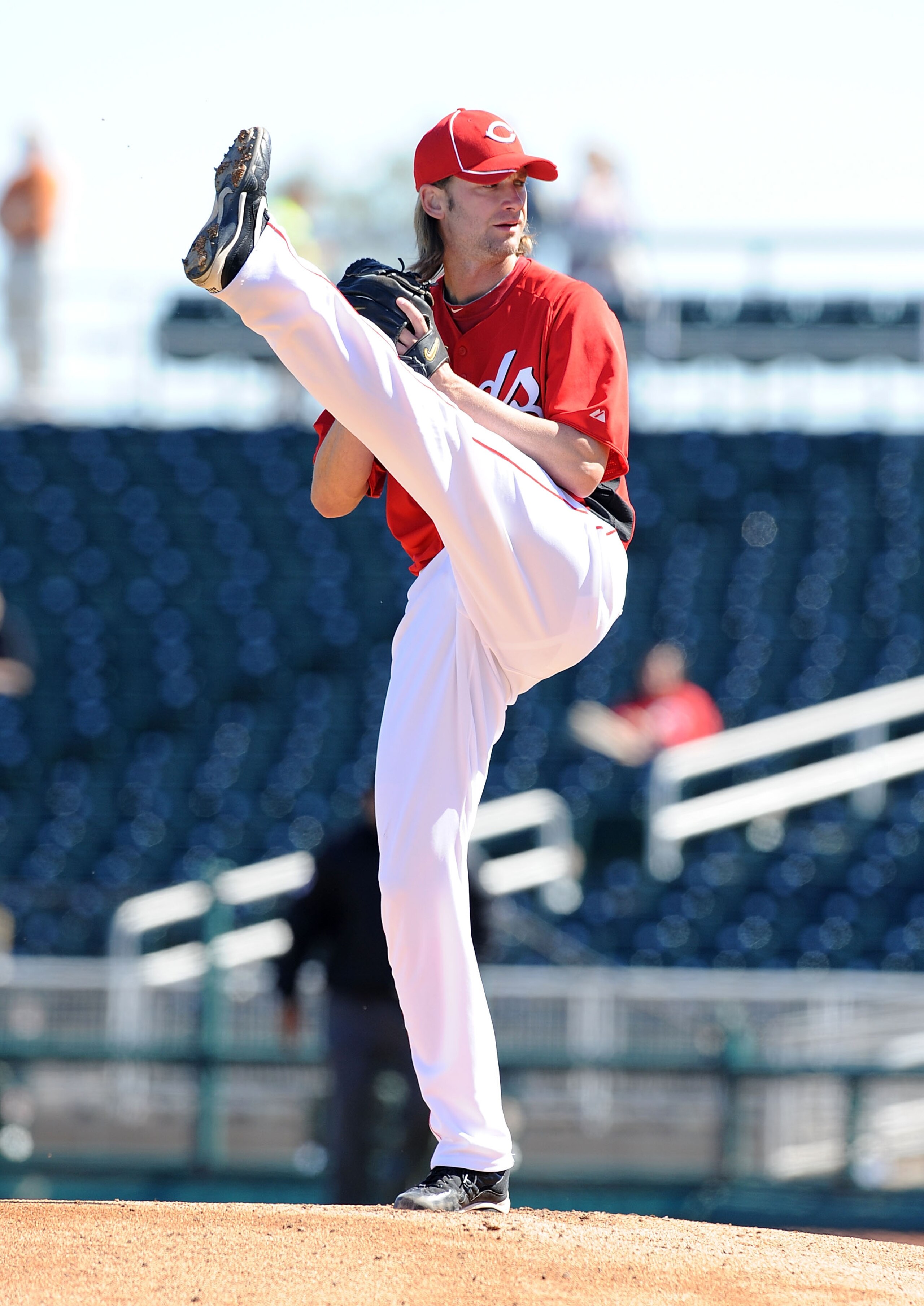 GOODYEAR, AZ - FEBRUARY 28:  Bronson Arroyo #61 of the Cincinnati Reds gets ready to deliver a pitch against the Cleveland Indians at Goodyear Ballpark on February 28, 2011 in Goodyear, Arizona.  (Photo by Norm Hall/Getty Images)