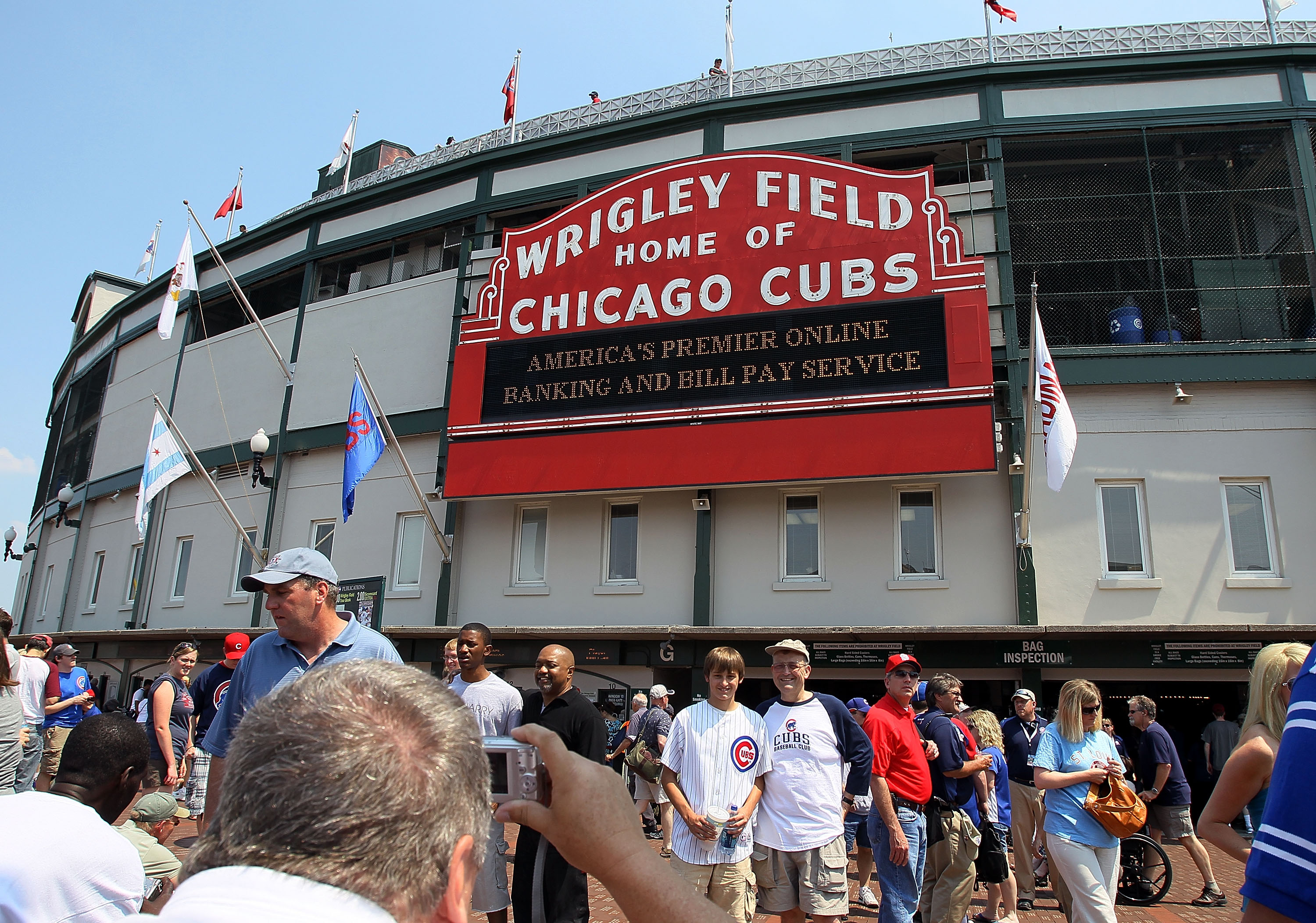 CHICAGO - MAY 30:  Fans arrive for the game between the St. Louis Cardinals and the Chicago Cubs on May 30, 2010 at Wrigley Field in Chicago, Illinois.  (Photo by Jim McIsaac/Getty Images)