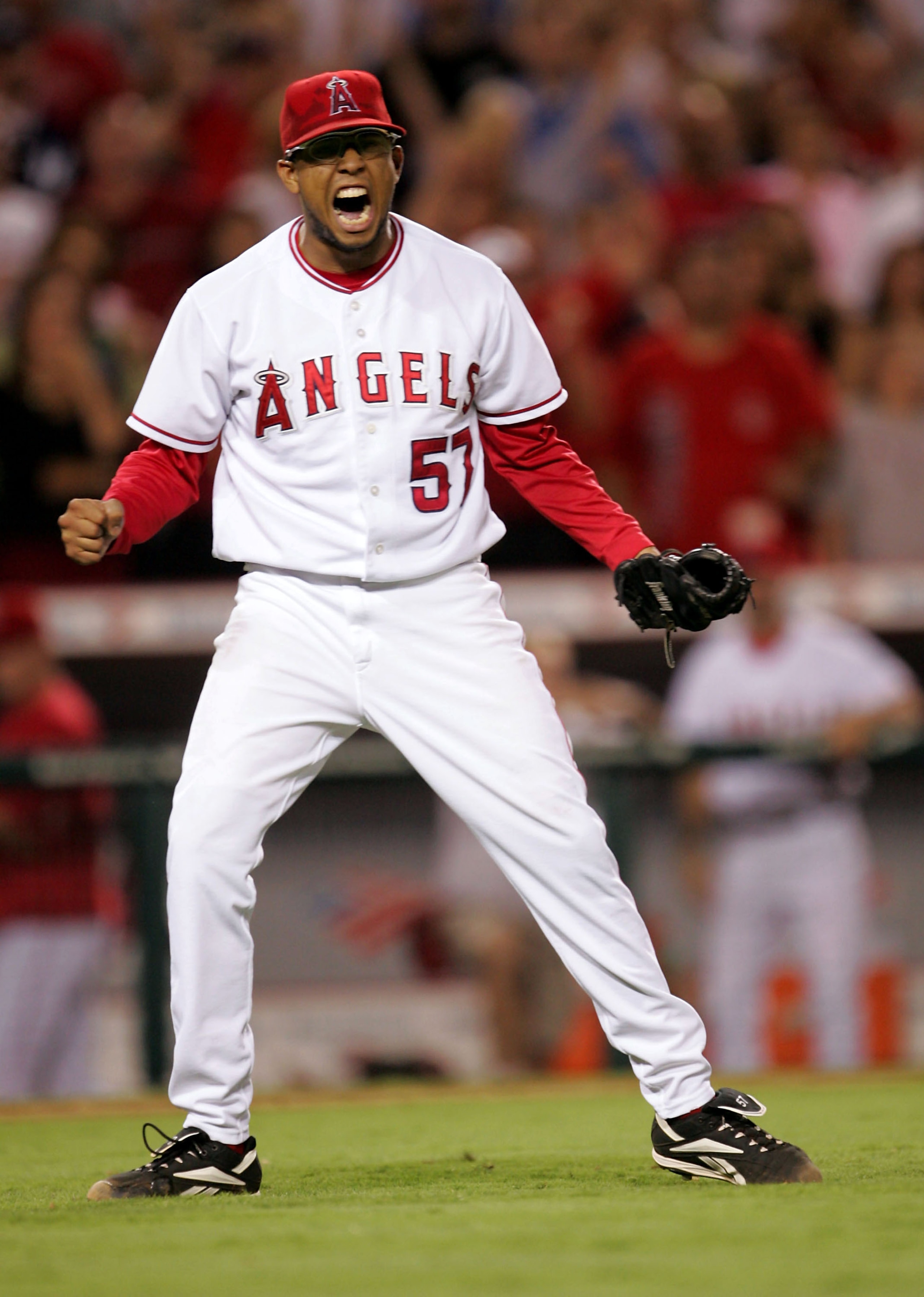 ANAHEIM, CA - JULY 21: Closer Francisco Rodriguez #57 of the Los Angeles Angels of Anaheim celebrates as the last out is made in the ninth inning in the game with the New York Yankees on July 21, 2005 at Angel Stadium in Anaheim, California. Rodriguez got