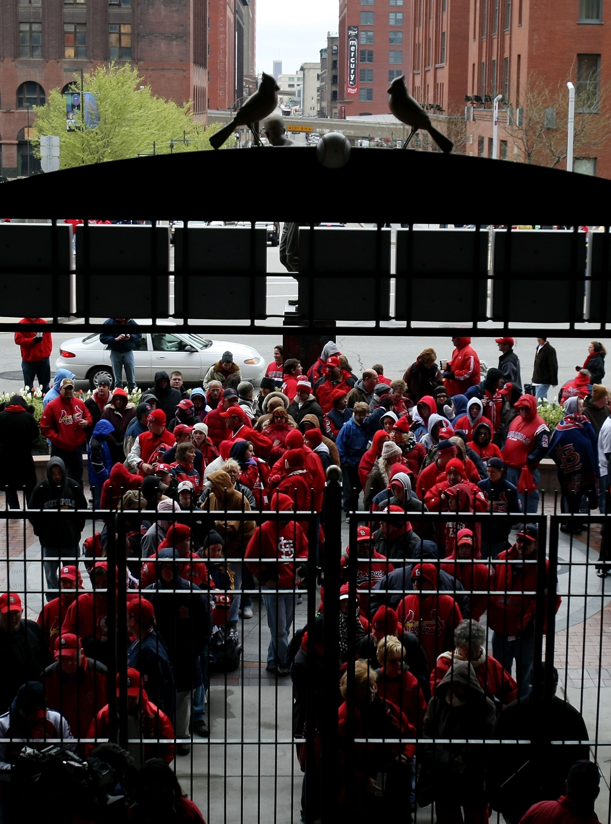 ST. LOUIS - APRIL 06:  Fans line outside the third base gate before the game between the St. Louis Cardinals and the Pittsburgh Pirates during Opening Day on April 6, 2009  at Busch Stadium in St. Louis, Missouri.  (Photo by Elsa/Getty Images)