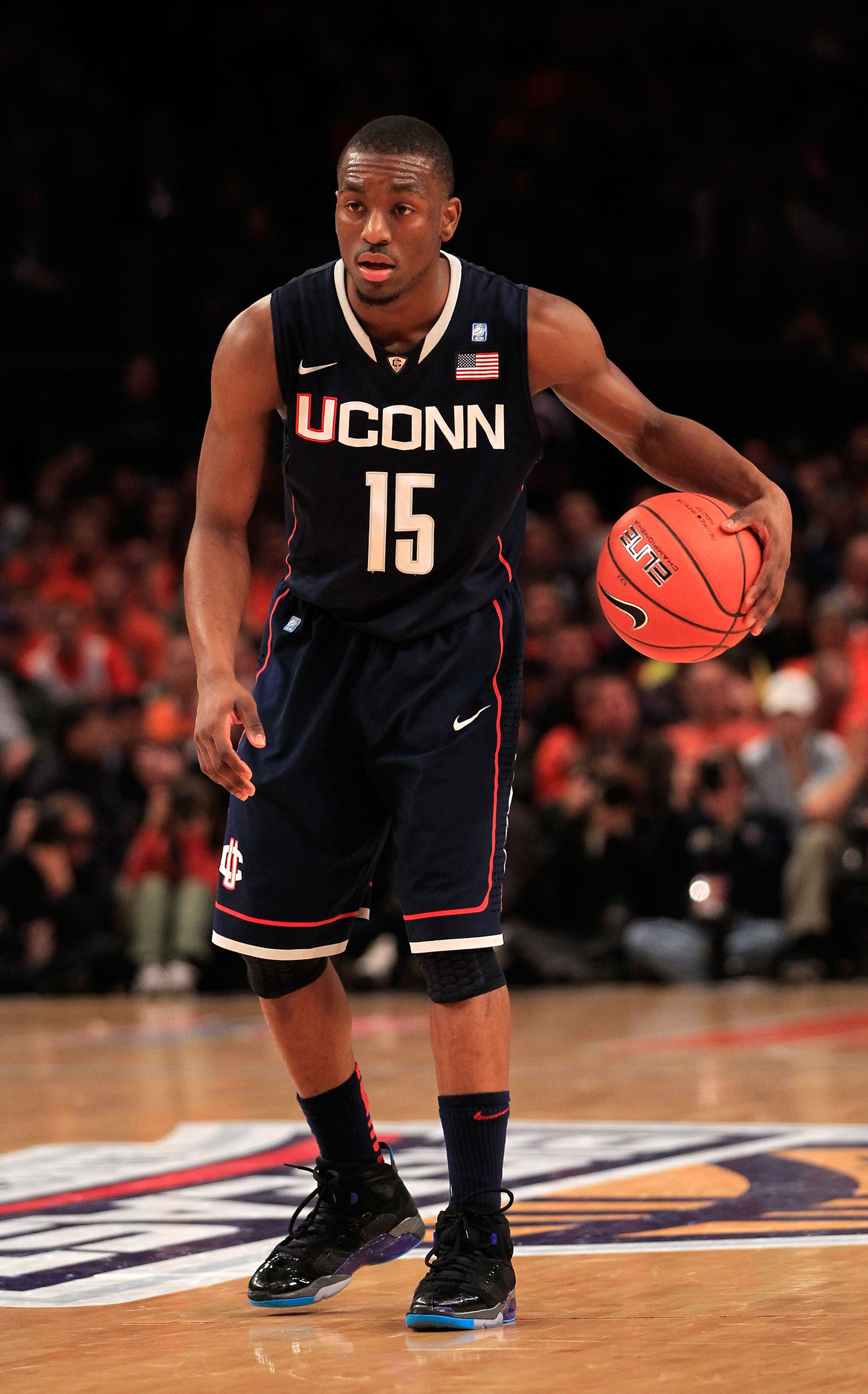 NEW YORK, NY - MARCH 10: Kemba Walker #15 of the Connecticut Huskies brings the ball up court against the Pittsburgh Panthers during the quarterfinals of the 2011 Big East Men's Basketball Tournament presented by American Eagle Outfitters  at Madison Squa