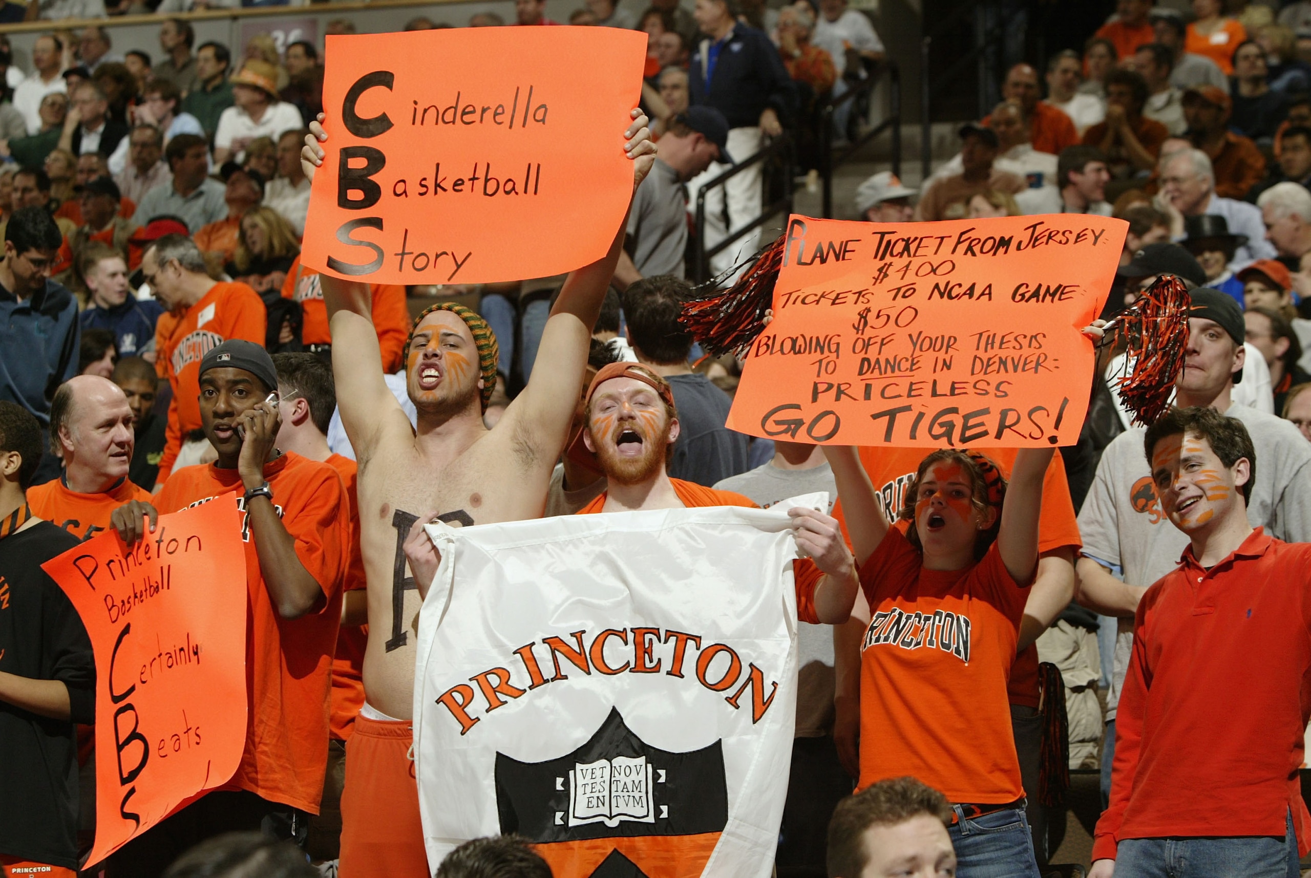 DENVER - MARCH 18:  Fans of the Princeton Tigers cheer during a timeout against the Texas Longhorns during their first round game of the NCAA Division I Men's Basketball Tournament March 18, 2004 at the Pepsi Center in Denver, Colorado.  (Photo by Brian B