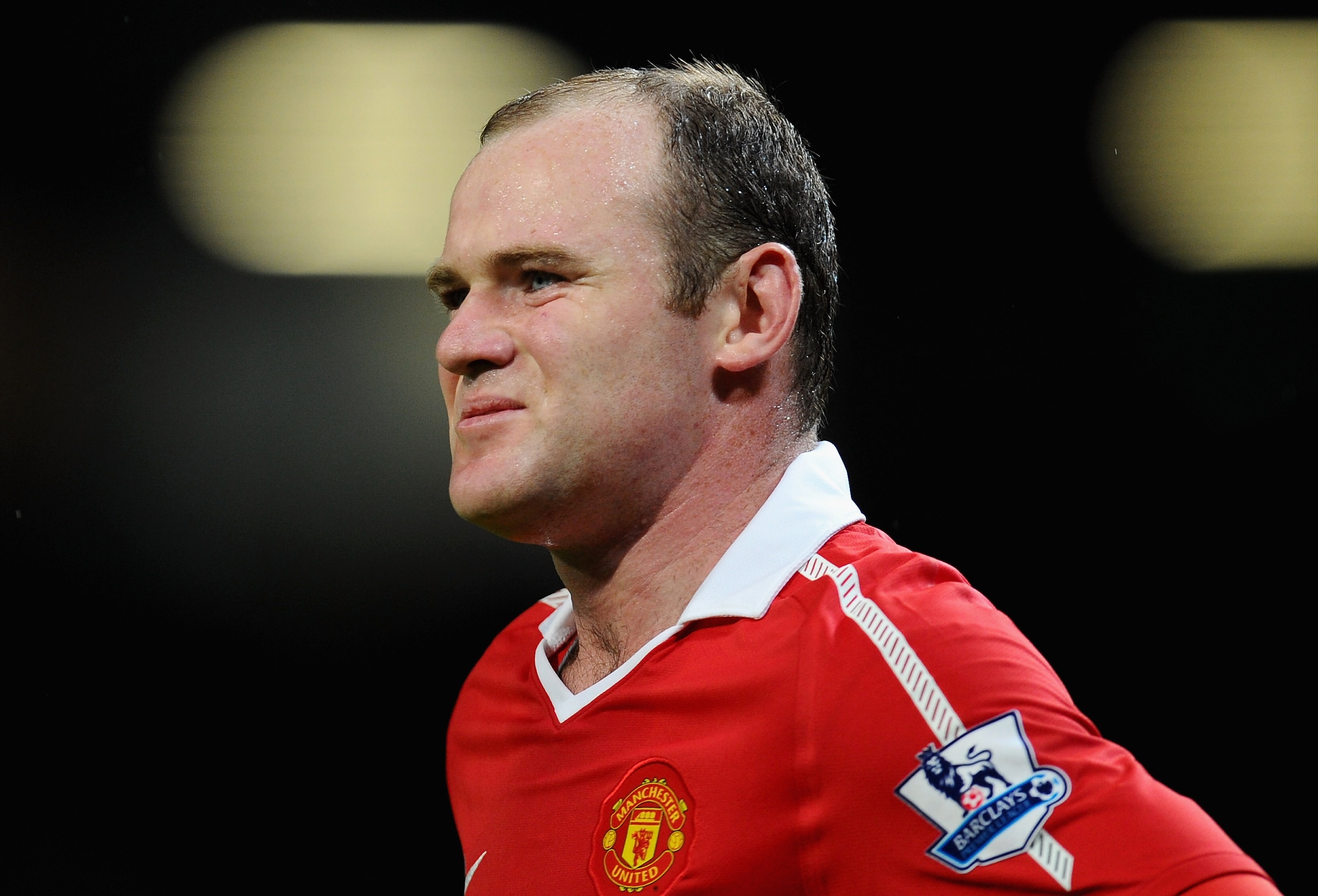 MANCHESTER, ENGLAND - MARCH 12:  Wayne Rooney of Manchester United looks on during the FA Cup sponsored by E.On Sixth Round match between Manchester United and Arsenal at Old Trafford on March 12, 2011 in Manchester, England.  (Photo by Clive Mason/Getty