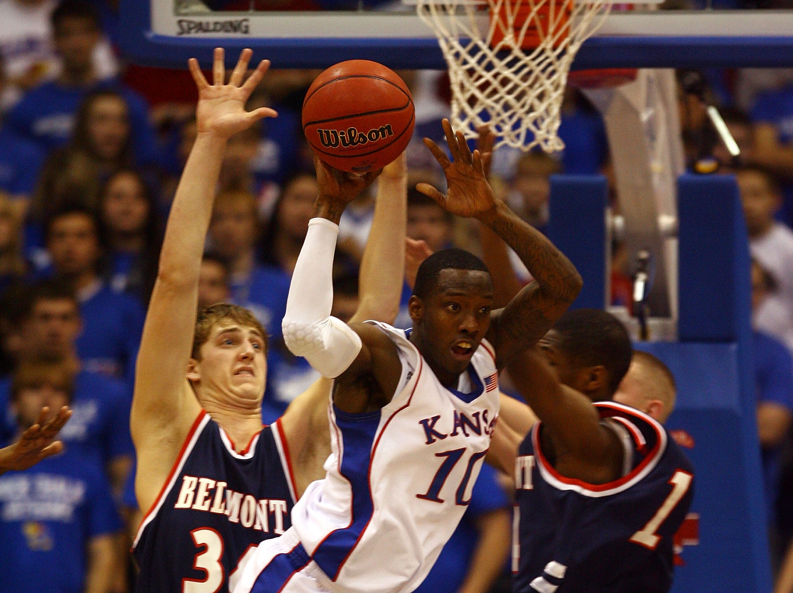 LAWRENCE, KS - DECEMBER 29:  Tyshawn Taylor #10 of the Kansas Jayhawks passes during the game against the Belmont Bruins on December 29, 2009 at Allen Fieldhouse in Lawrence, Kansas.  (Photo by Jamie Squire/Getty Images)