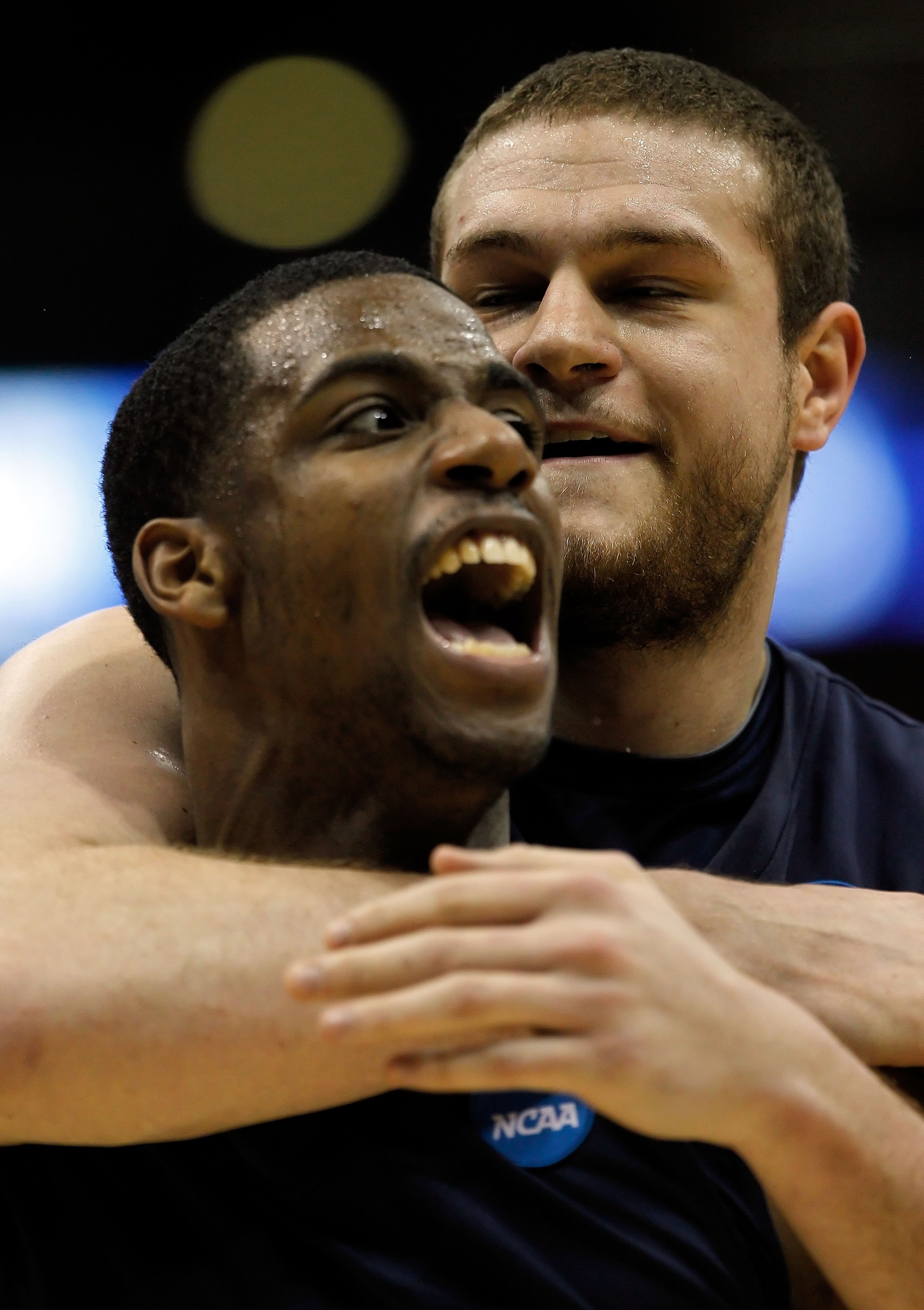 MILWAUKEE - MARCH 21:  (L-R) Dante Jackson #25 and Kenny Frease #32 of the Xavier Musketeers react in the first half while taking on the Pittsburgh Panthers during the second round of the 2010 NCAA men's basketball tournament at the Bradley Center on Marc